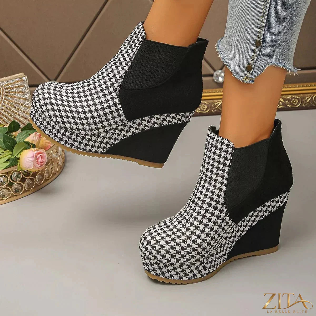 Zita La Belle Elite houndstooth pattern wedge ankle boots with stylish design and ankle height, featuring a bold black and white pattern.