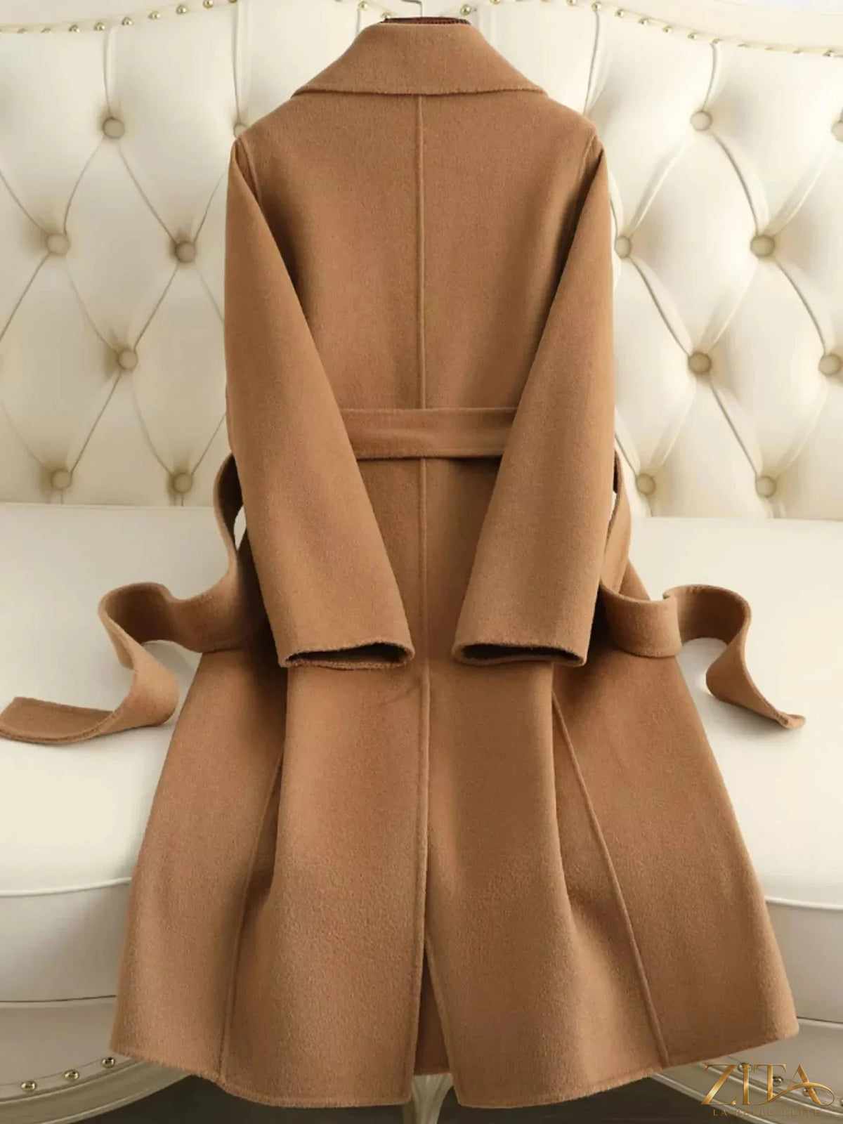 Zita La Belle Elite longline wool coat with waist-defining belt, featuring a tailored fit and classic design in neutral tones.