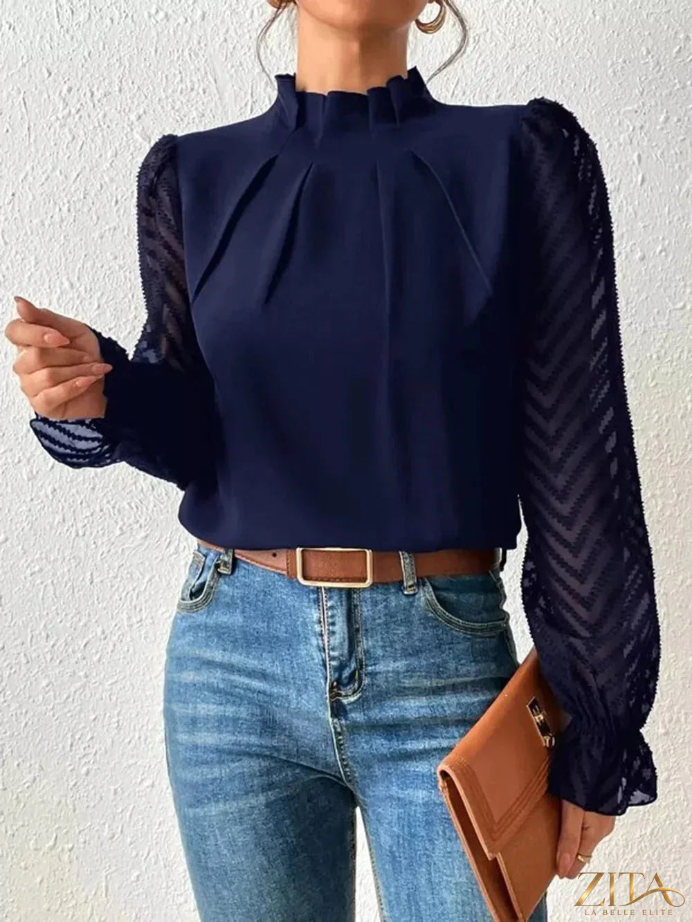 Zita La Belle Elite mock neck blouse with flounce sleeves, featuring elegant ruffle details and a fitted silhouette.