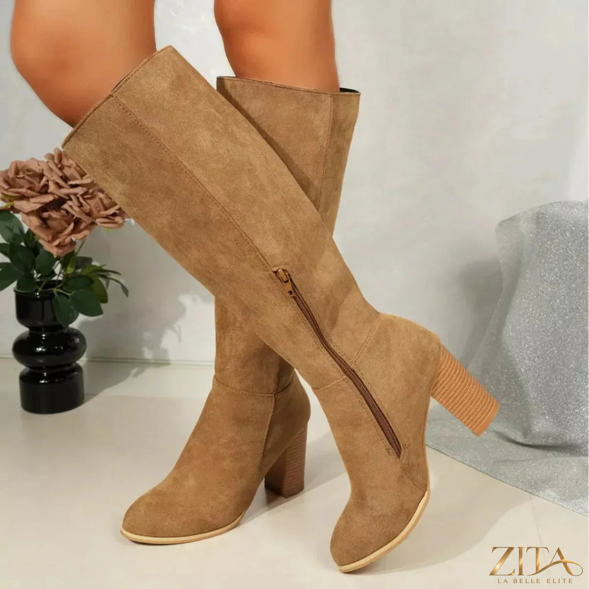 Zita La Belle Elite point toe block heel boots in black leather, featuring sleek design and sturdy block heels.