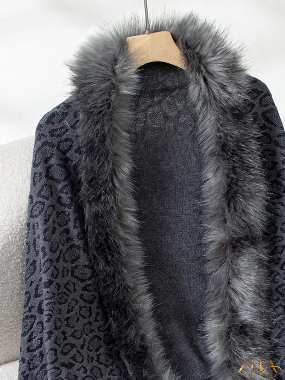 Leopard print fringe open front long sleeve poncho in neutral tones, stylish and cozy from Trendsi.