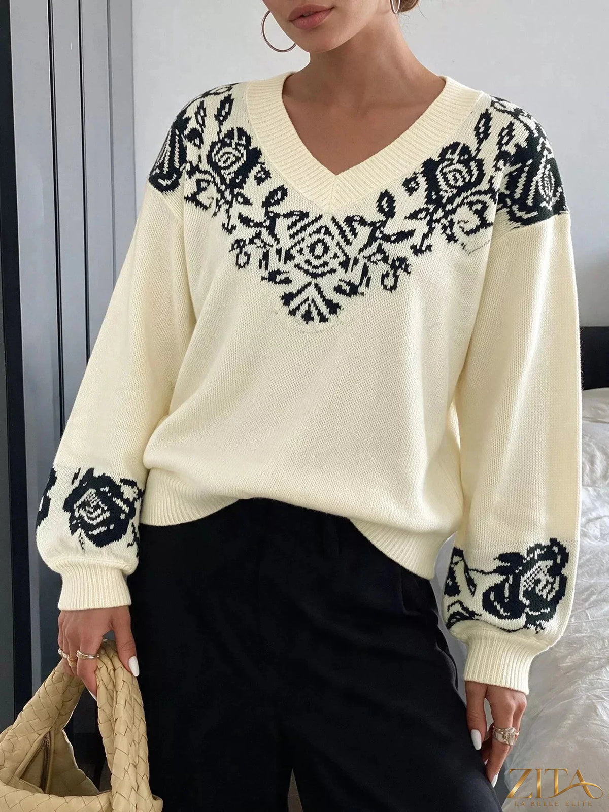 Zita La Belle Elite floral dropped shoulder sweater featuring a colorful floral pattern and relaxed fit.