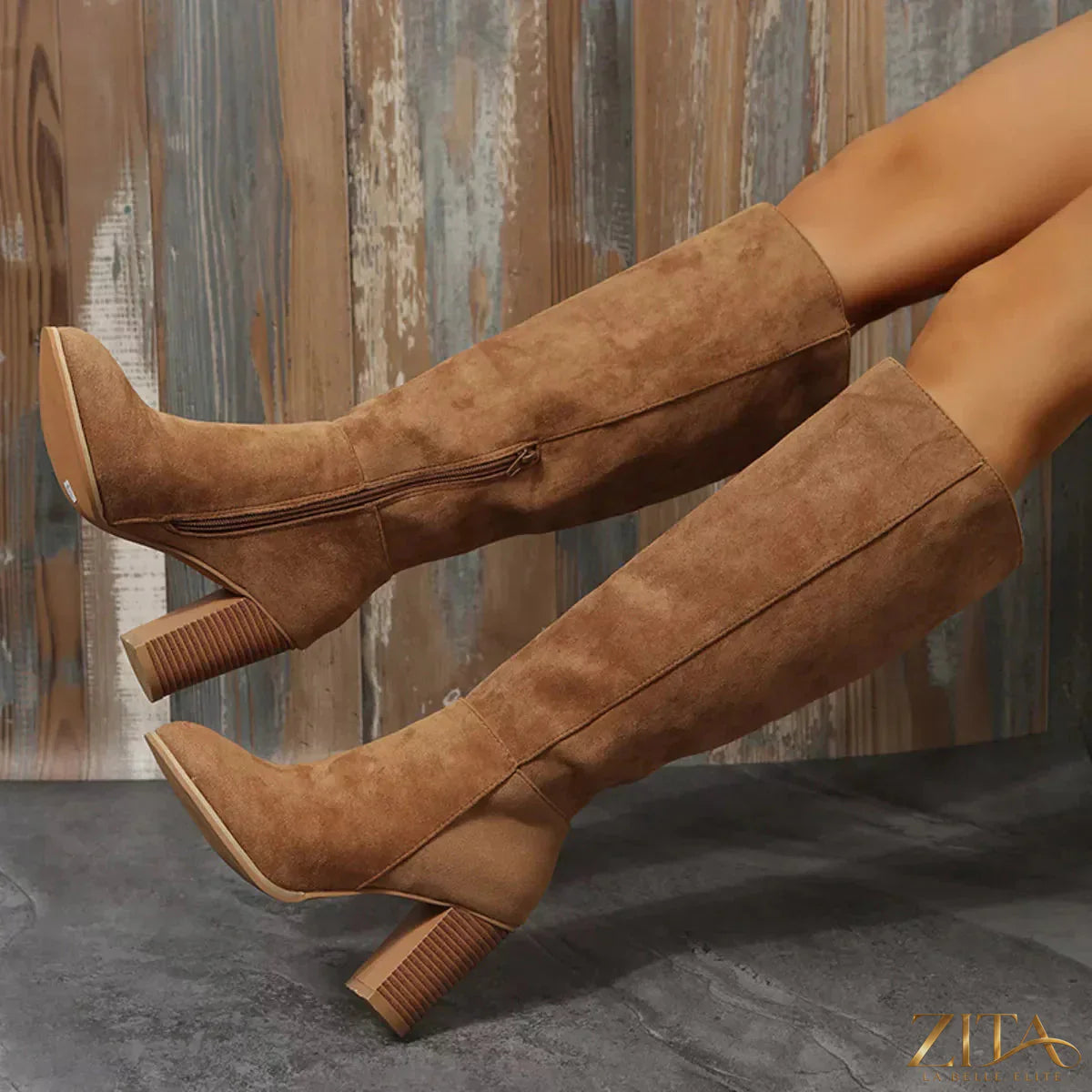Zita La Belle Elite point toe block heel boots featuring sleek design and stylish ankle height with smooth leather finish.