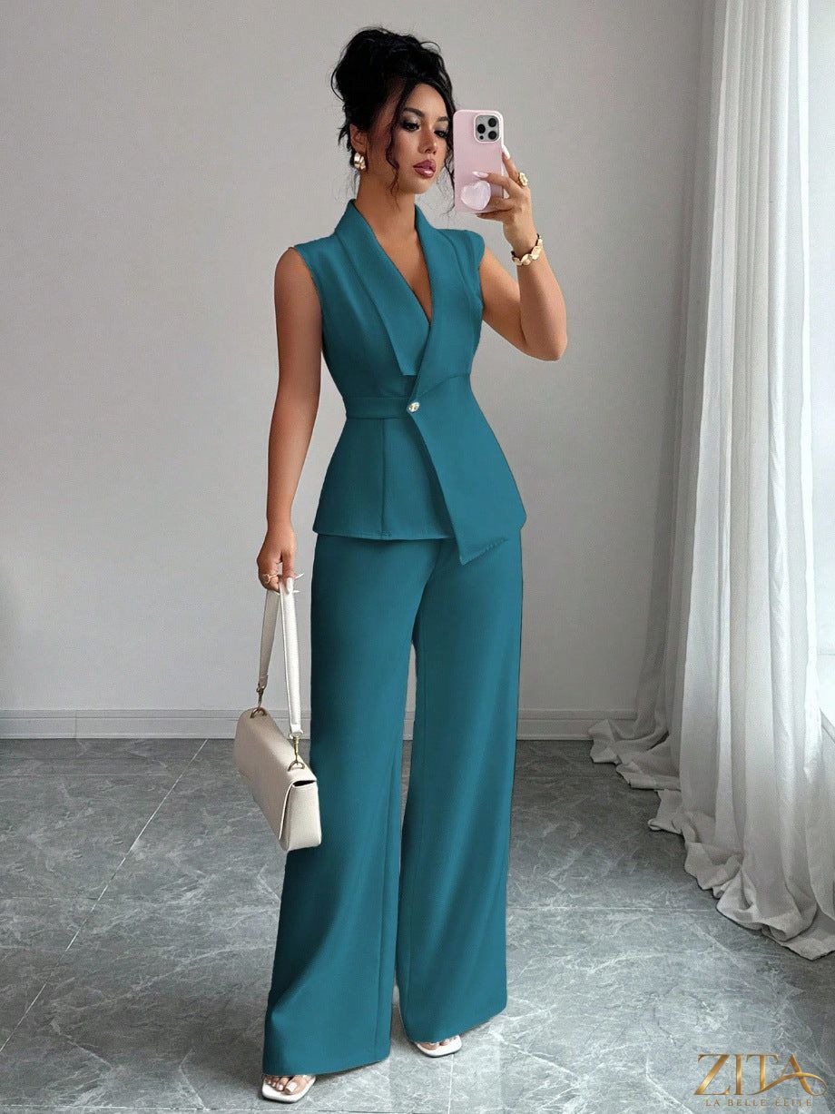 Zita La Belle Elite women's sleeveless peplum blazer and wide-leg pants two-piece set, shown on a model in neutral tones.