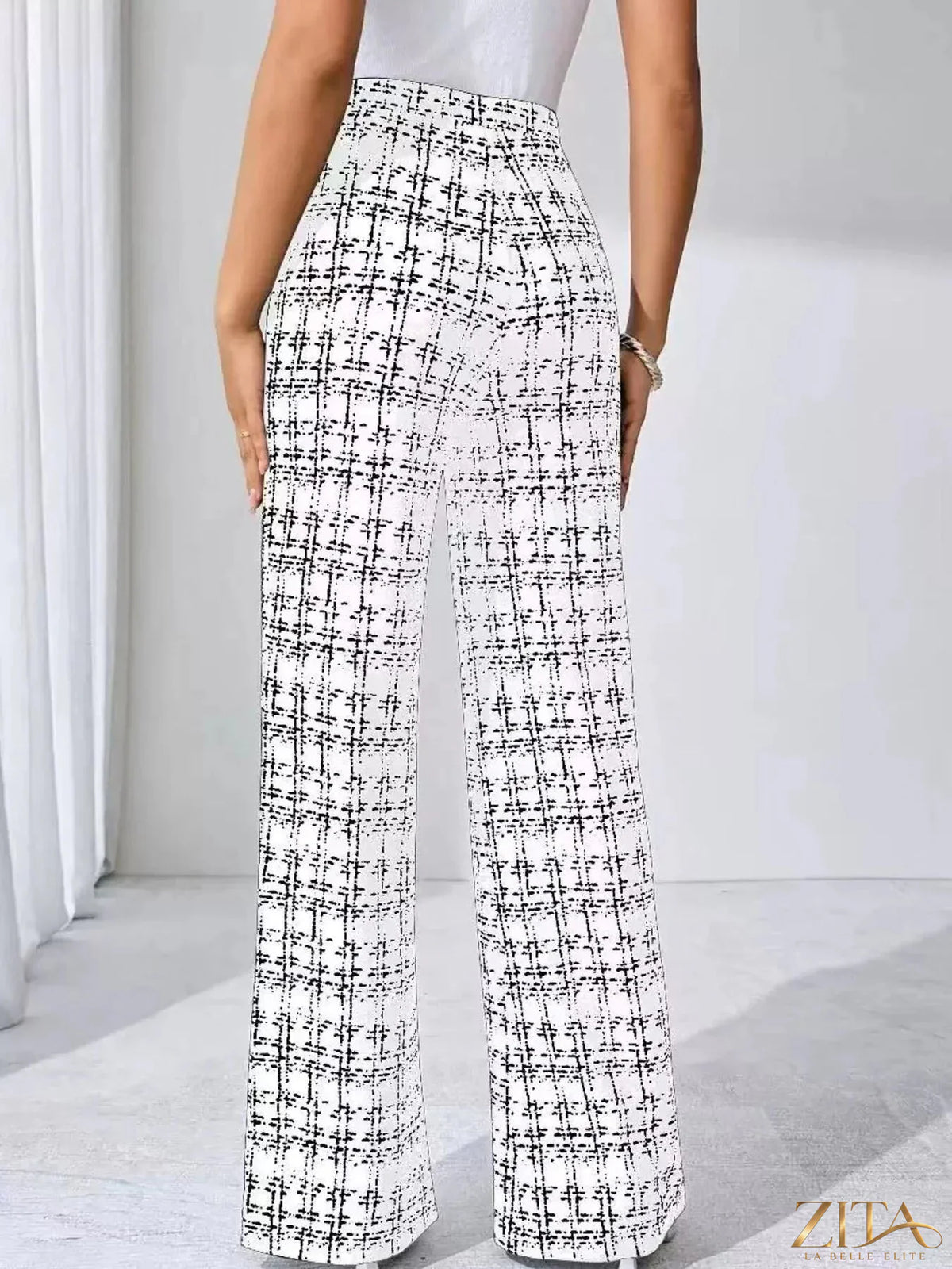Zita La Belle Elite plaid wide leg pants with a relaxed fit, featuring a stylish checkered pattern and high waist design.