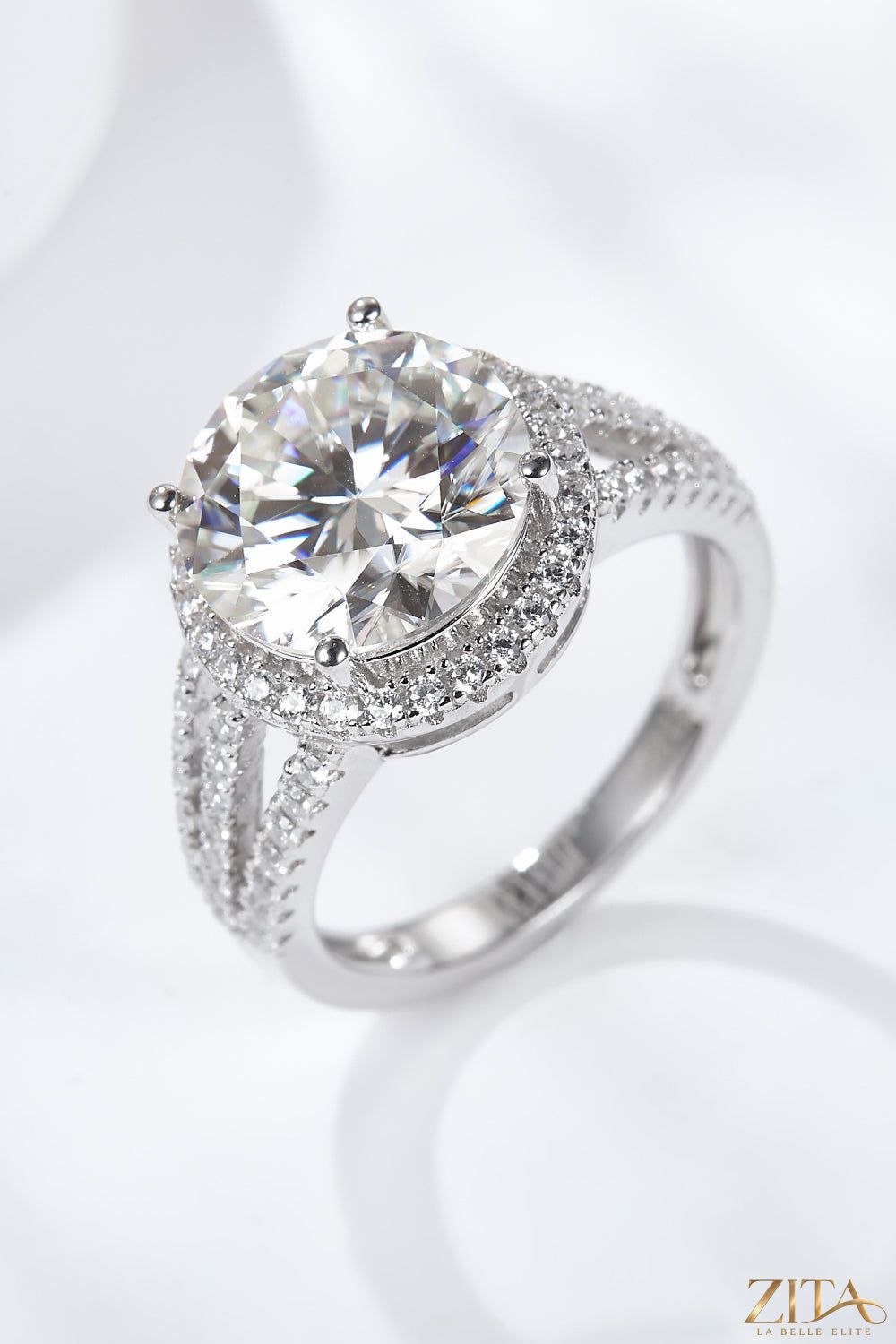 5 Carat Moissanite split shank ring featuring sparkling stones and a sleek band, showcasing elegant jewelry design.