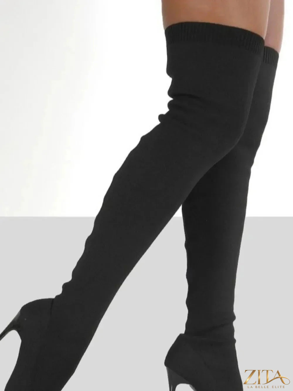 Point toe over knee stiletto boots by Zita La Belle Elite featuring sleek design and high heels, shown on a model's legs.