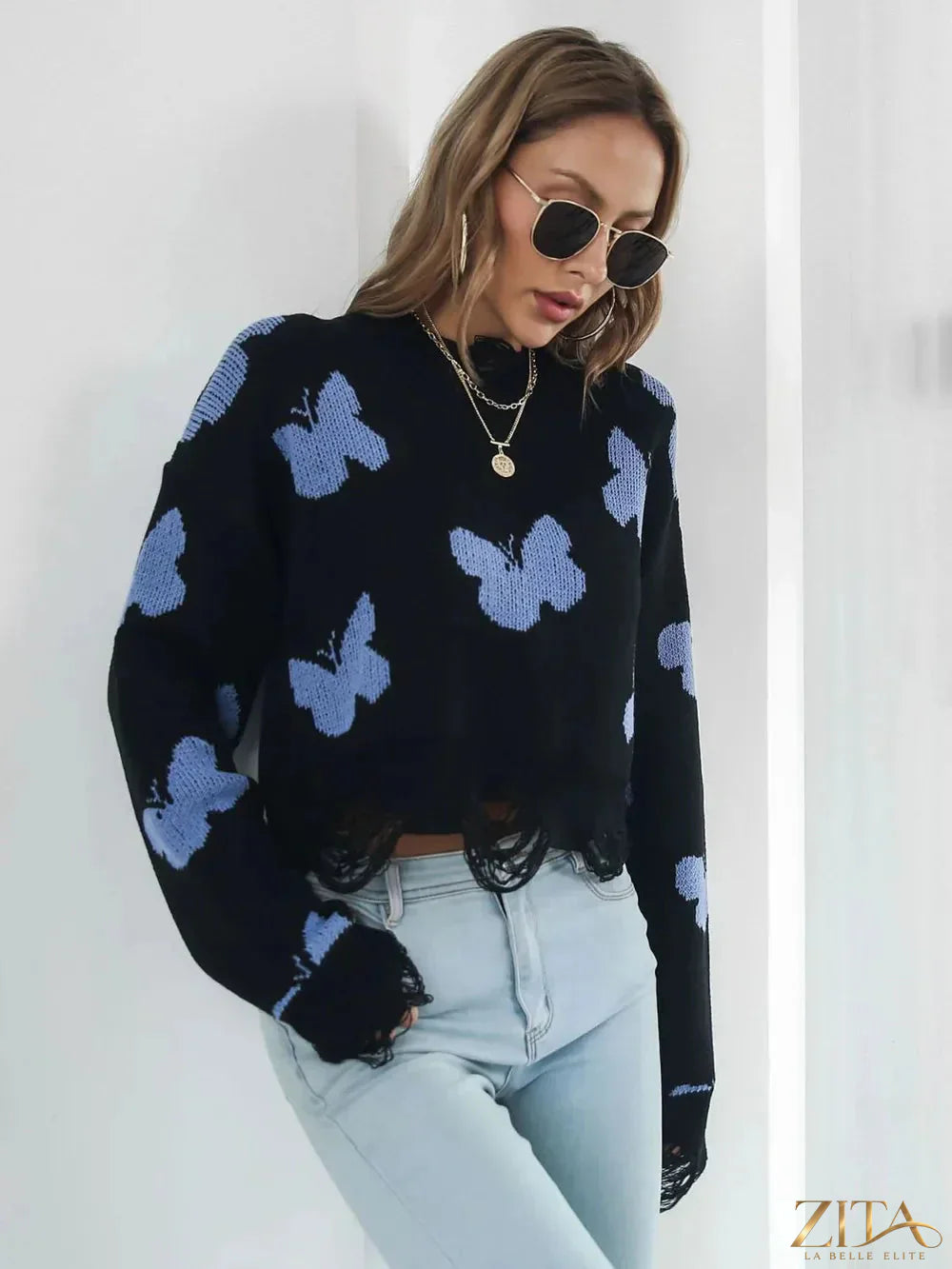 Zita La Belle Elite distressed butterfly cropped sweater with ripped details, soft fabric, and a stylish, casual fit.