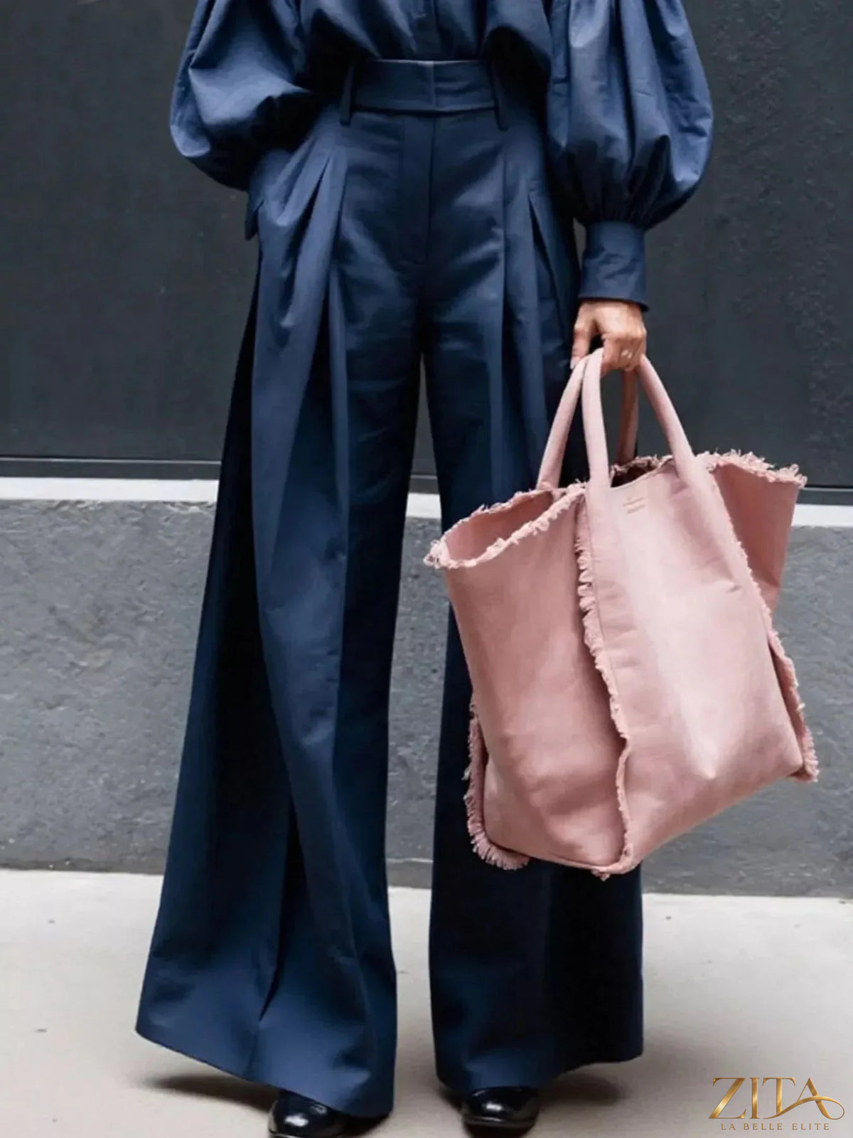 Zita La Belle Elite lantern sleeve shirt with wide leg pants set, featuring flowy fabric and stylish design, on a model.