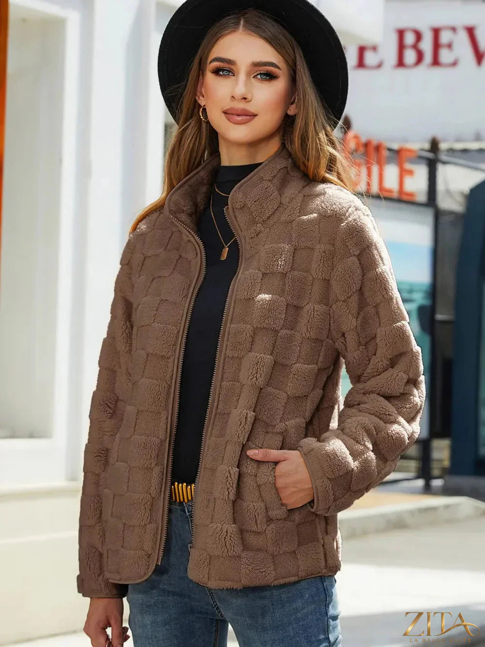Zita La Belle Elite fuzzy checkered zip-up jacket featuring a soft, stylish design with a front zipper and cozy fabric.