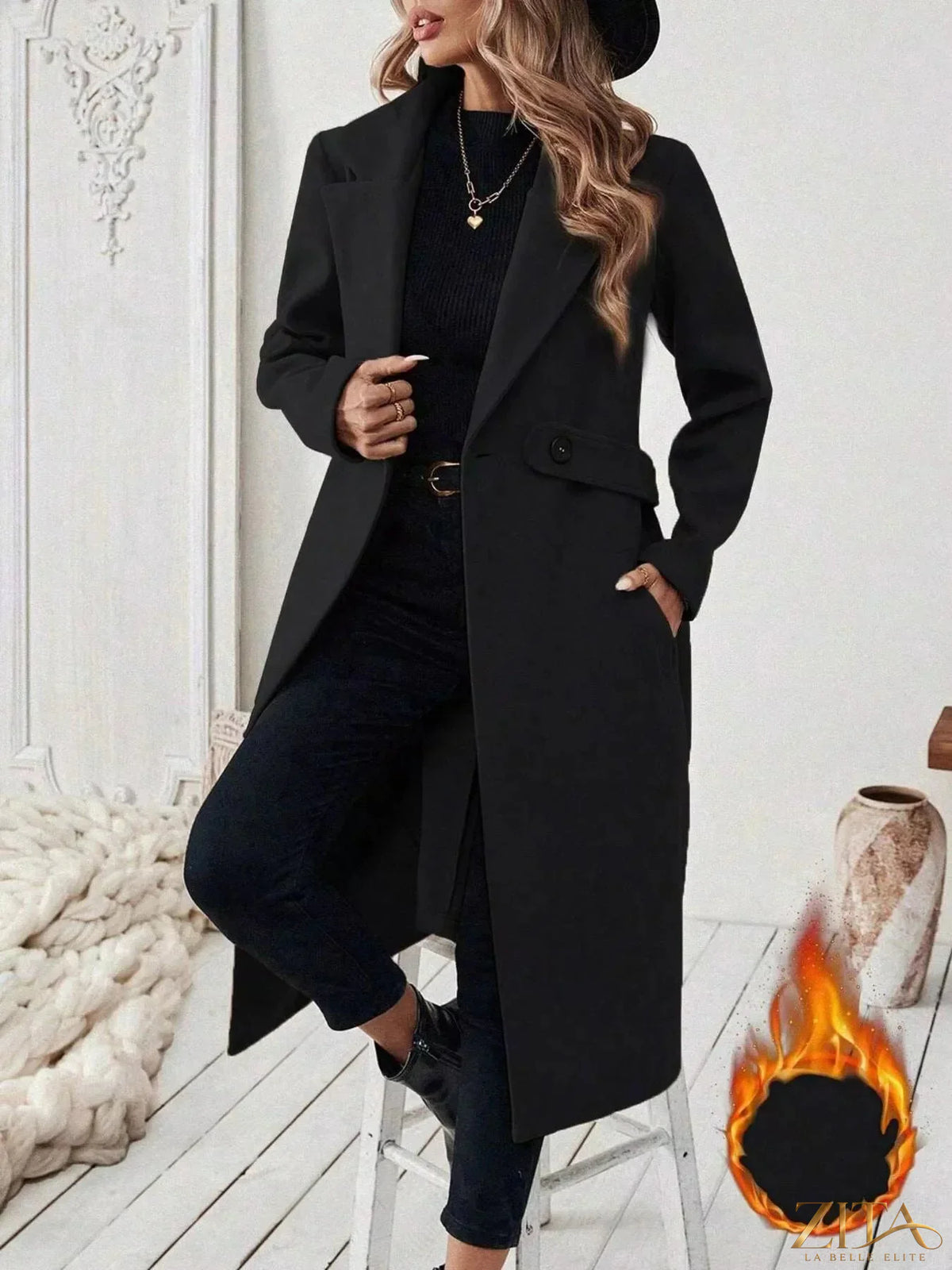 Longline coat with single-button closure from Zita La Belle Elite, featuring a sleek, tailored design in neutral fabric.