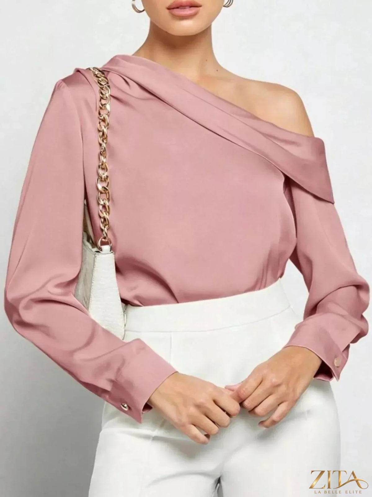 Elegant one-shoulder satin blouse by Zita La Belle Elite, featuring a sleek design with a smooth, shiny fabric and fashionable asymmetrical style.
