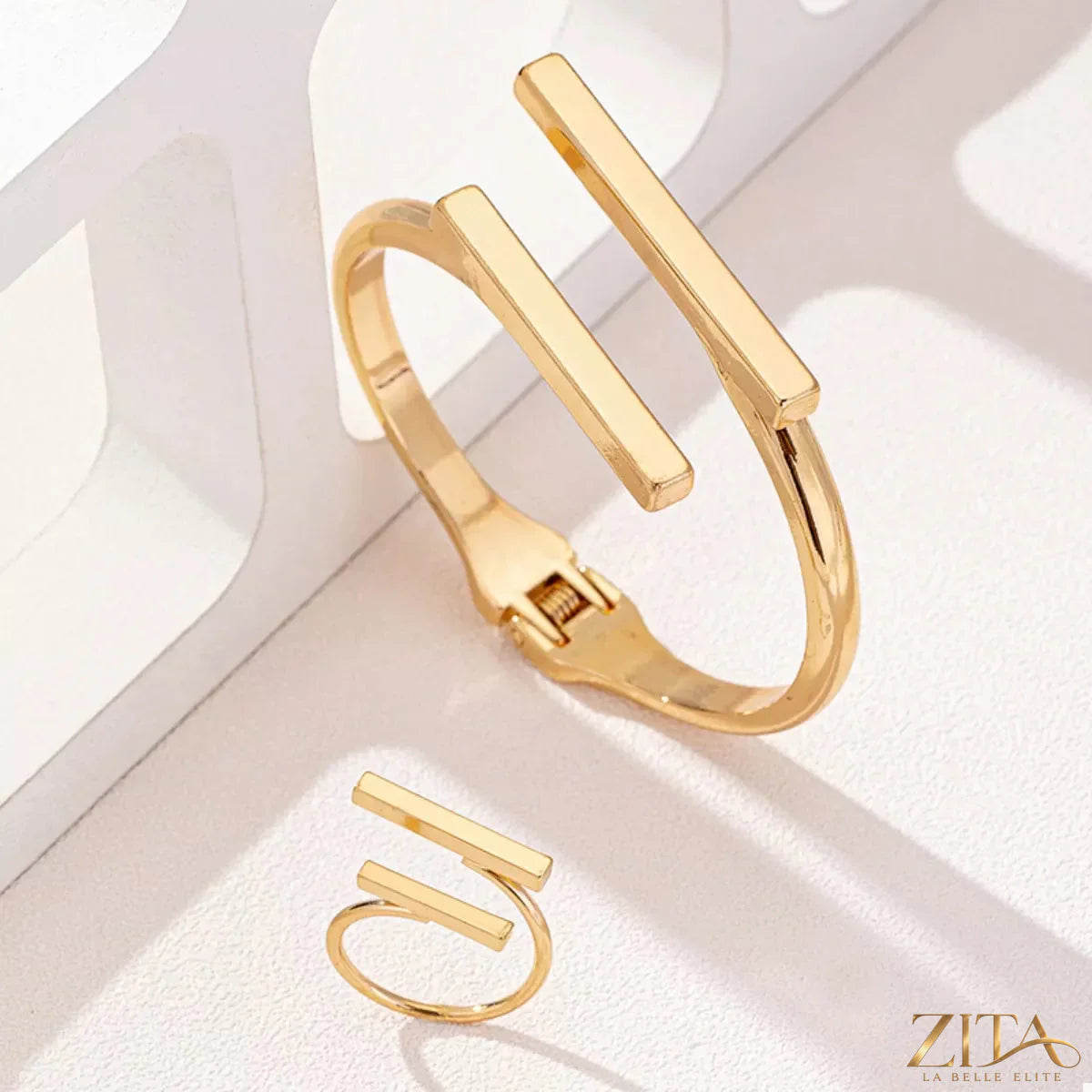 Adjustable 18K gold-plated modern bar bracelet and ring jewelry set with sleek, minimalist design and contemporary style.