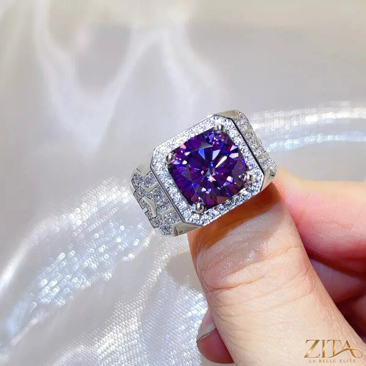 Sterling silver moissanite ring with a 5 carat center stone, showcasing sparkling brilliance and intricate band design.