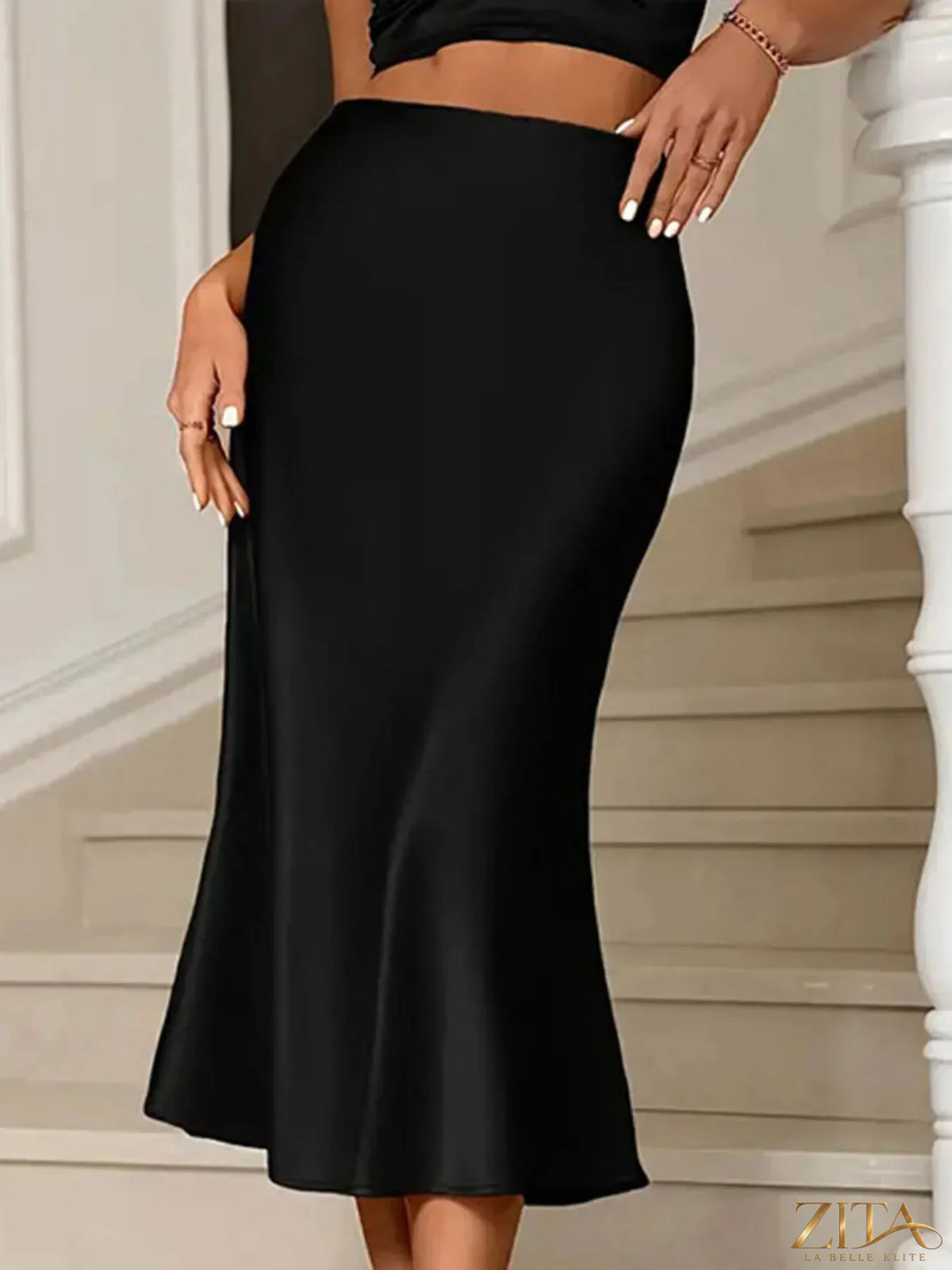 Satin midi mermaid skirt in a sleek, fitted design with a shiny finish, perfect for elegant or formal occasions.