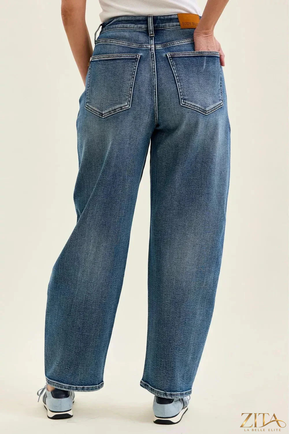 Judy Blue high waist Marlow arc distressed indigo jeans with weathered denim finish and classic five-pocket design.