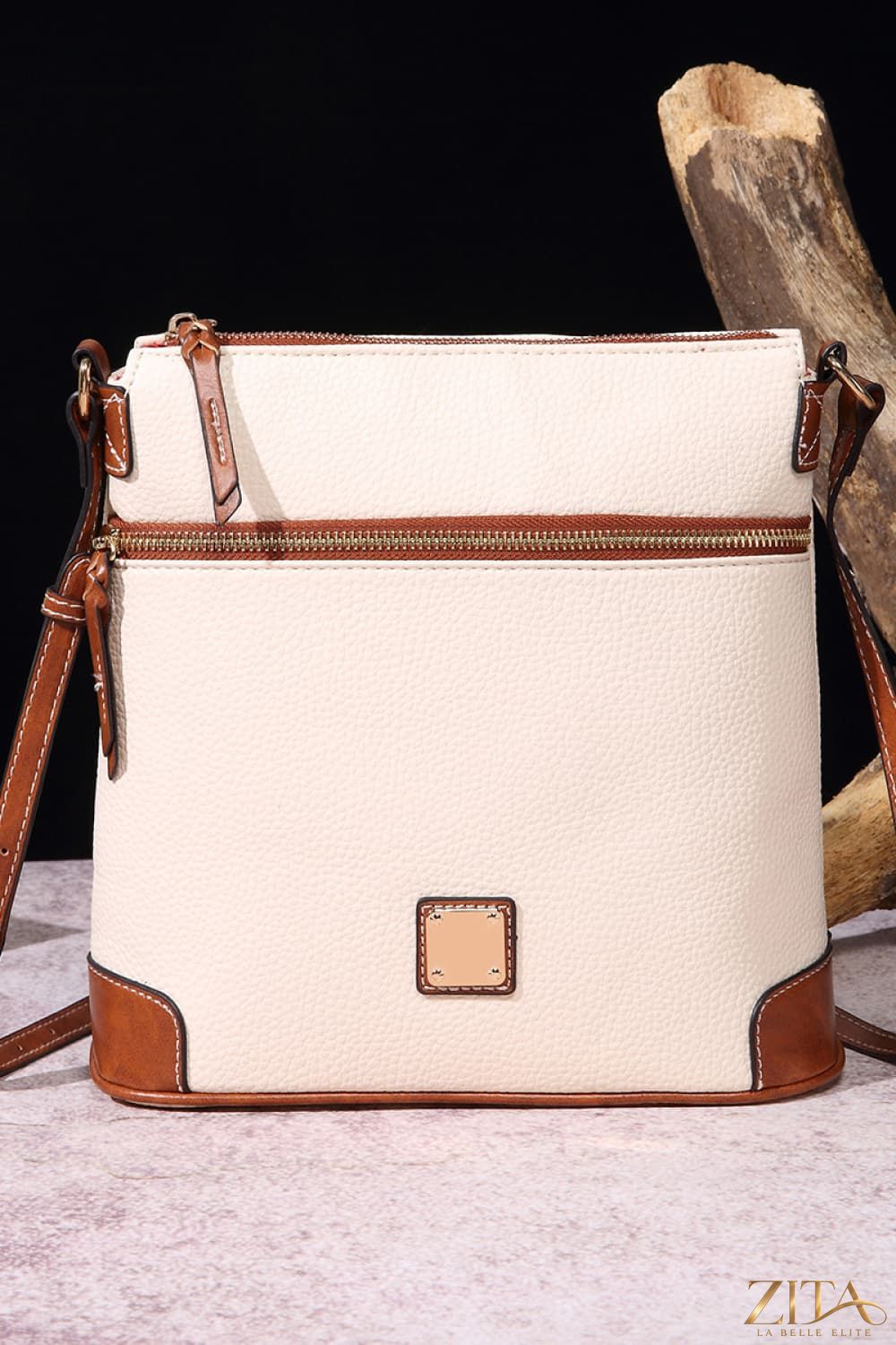 Zita La Belle Elite PU leather crossbody bag with adjustable strap and gold-tone hardware on a white background.