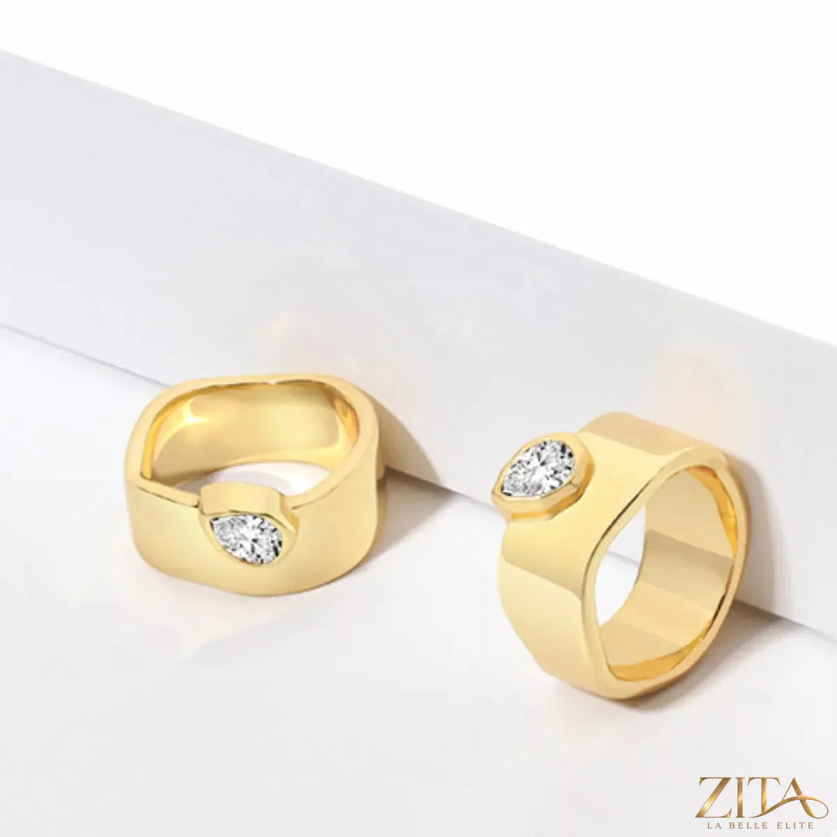18K gold-plated minimalist design ring by Zita La Belle Elite featuring a sleek, simple band on a white background.