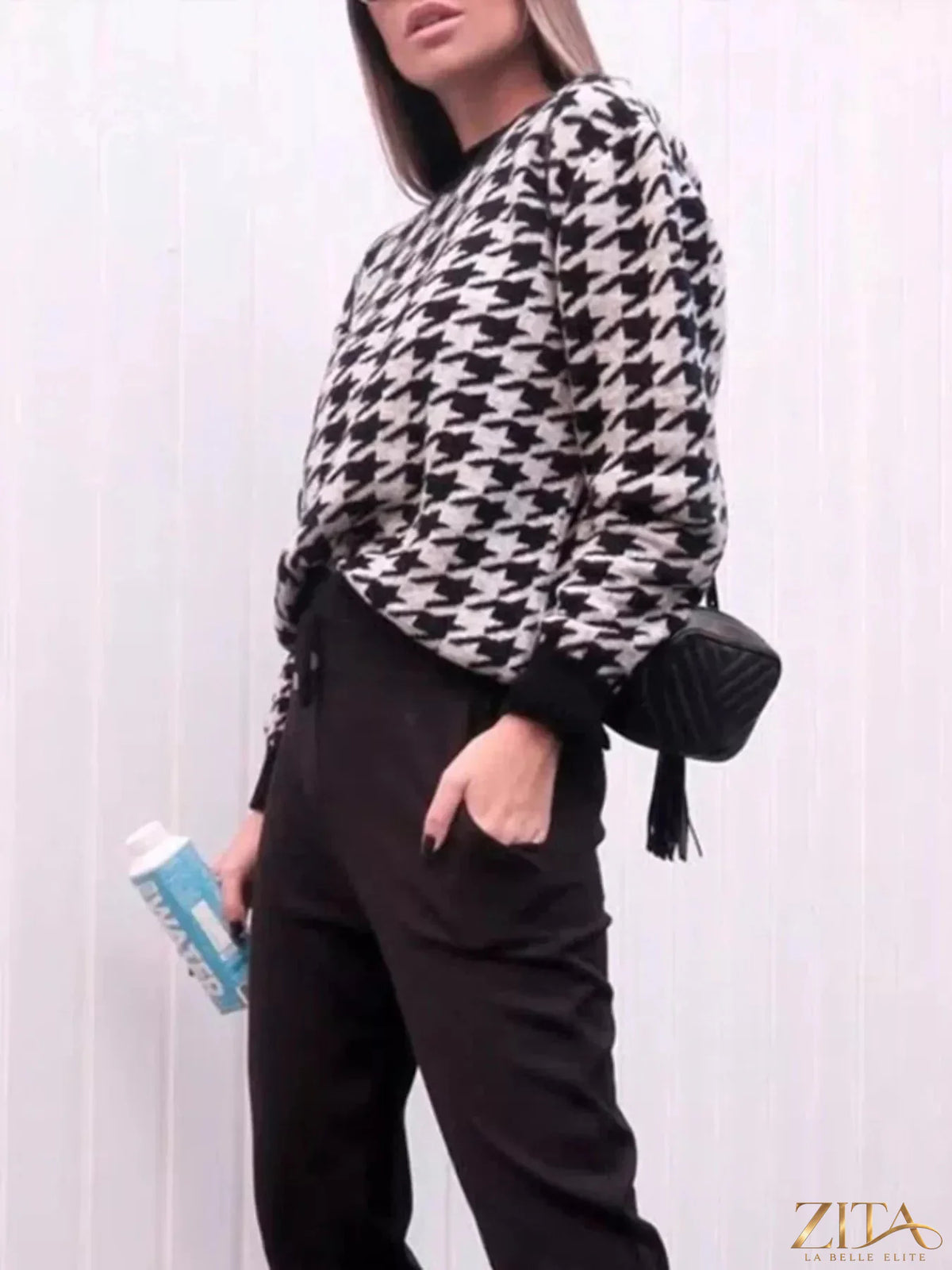 Zita La Belle Elite houndstooth oversized sweater with a cozy fit and classic black-and-white pattern, displayed on a neutral background.