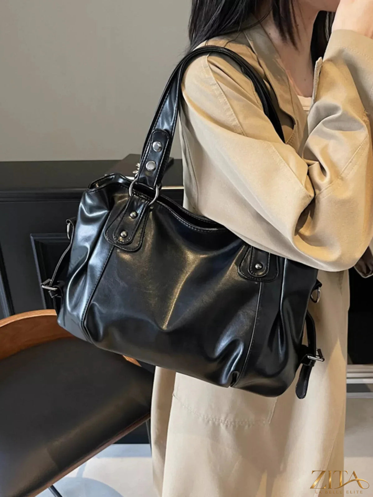 Vintage style leather handbag from Trendsi with a classic design, featuring sturdy leather straps and a spacious interior.
