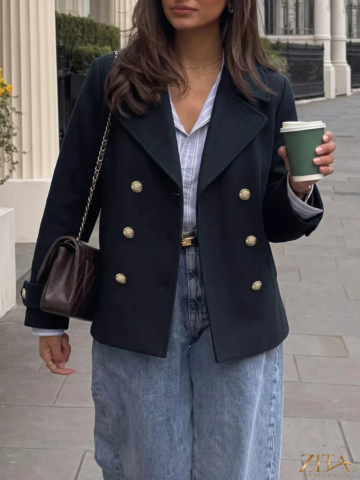 Zita La Belle Elite gold button double-breasted blazer with tailored fit and stylish lapels, shown on a model.