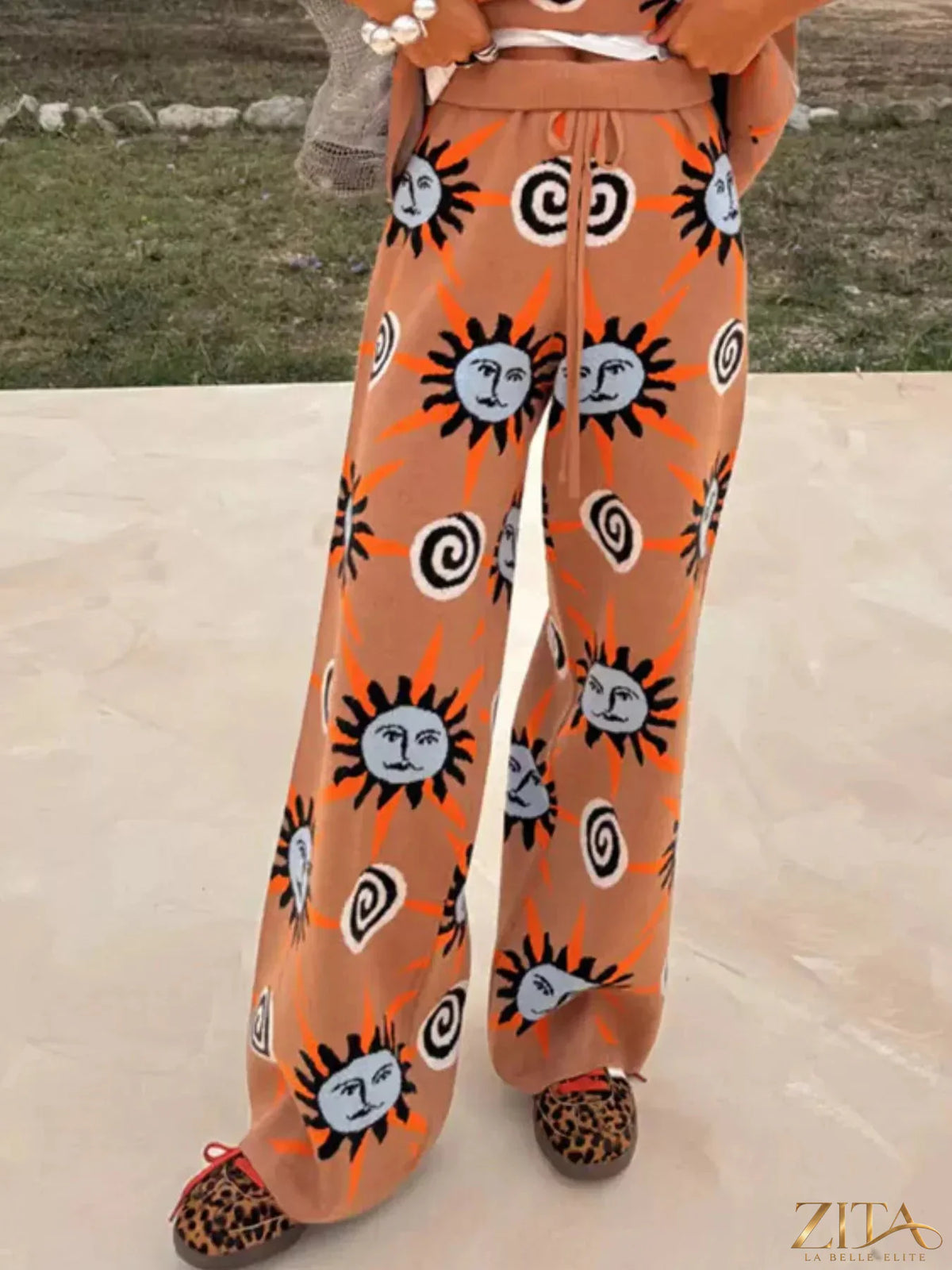 Zita La Belle Elite sun graphic top, matching cardigan and pants 3-piece sweater set displayed on a mannequin.