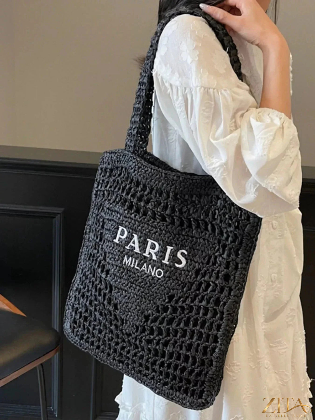 Crochet knit shoulder bag by Zita La Belle Elite with a textured pattern and adjustable strap, stylish accessory for casual outfits.