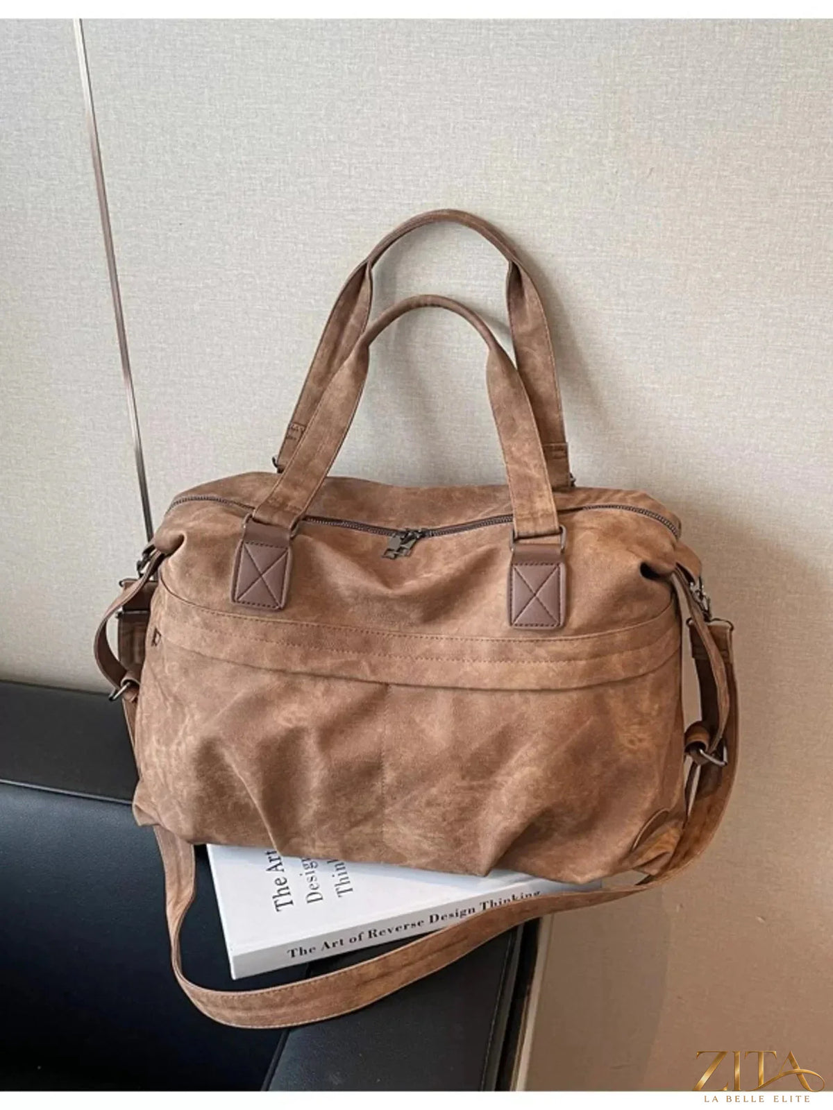 Vintage adjustable strap duffel bag by Zita La Belle Elite, featuring leather accents and spacious interior for travel or gym use.