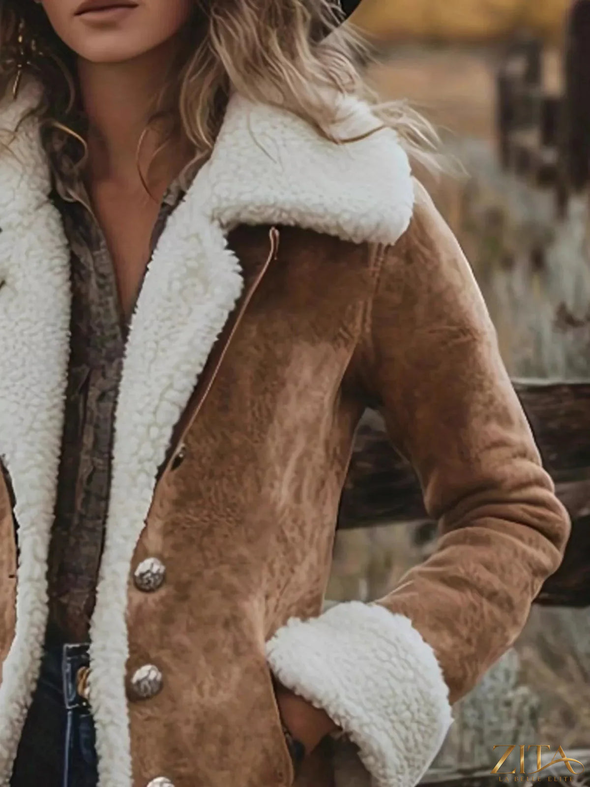 Zita La Belle Elite sherpa-lined button-up jacket with a cozy, warm interior and classic collar, displayed on a hanger.