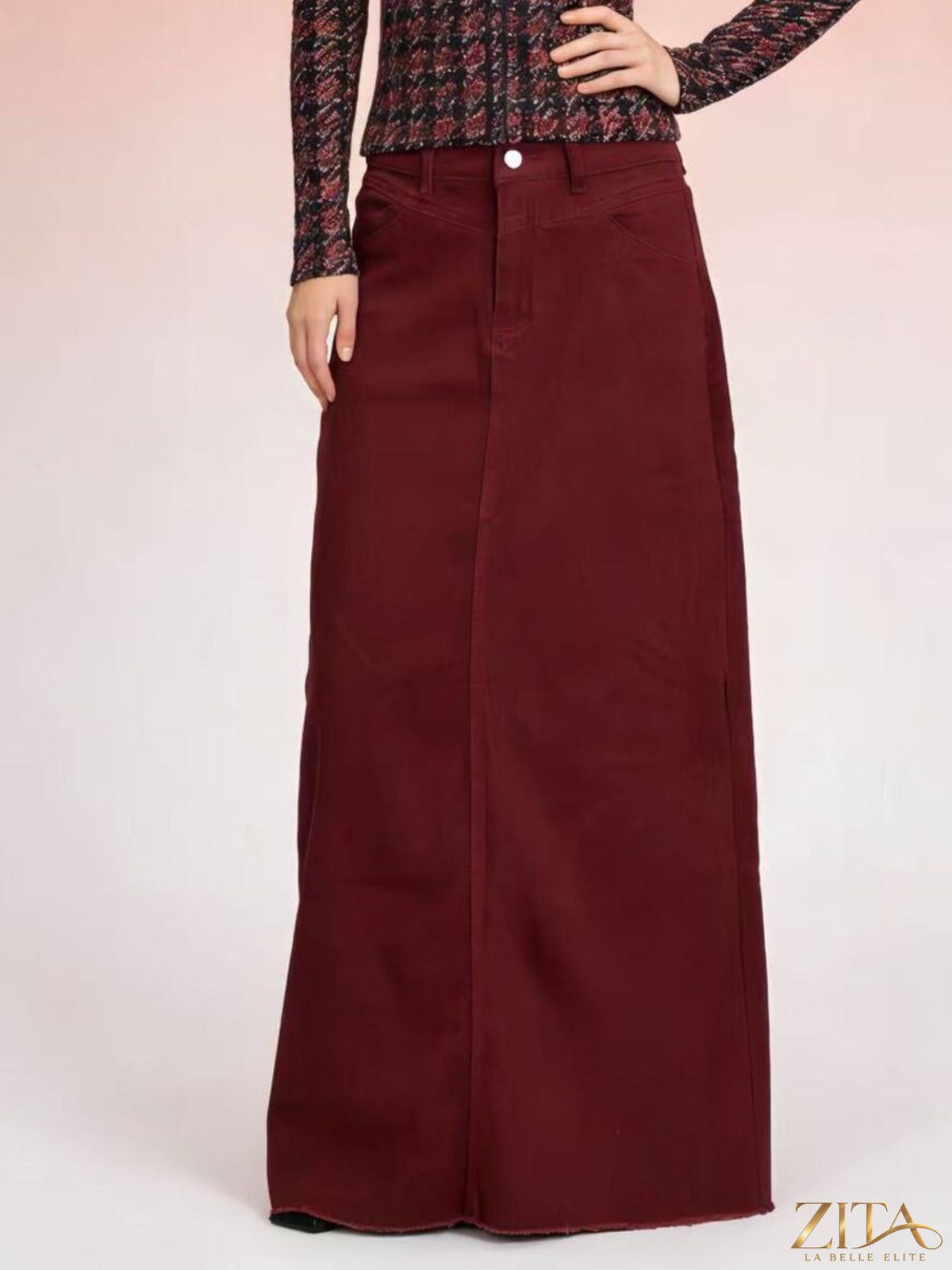 Raw hem maxi denim skirt by Zita La Belle Elite, showing a flowing denim skirt with a raw hem and full length design.