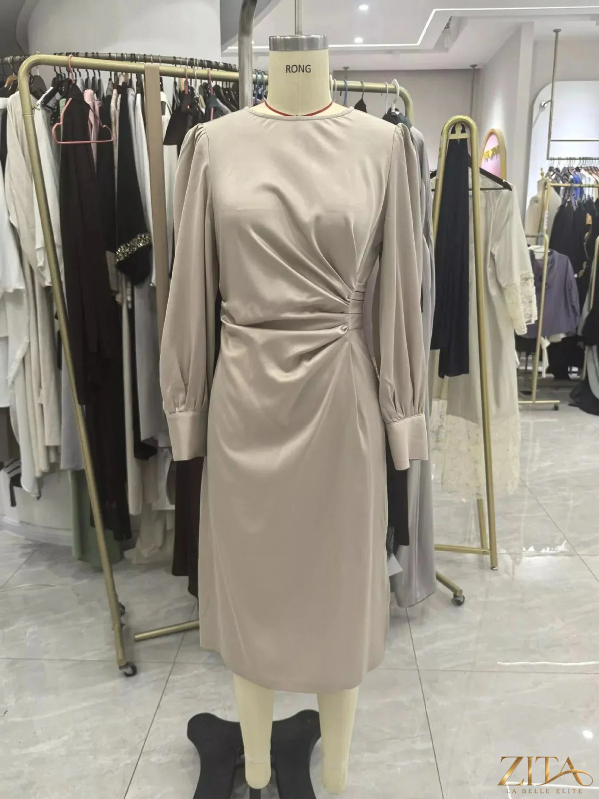 Zita La Belle Elite long sleeve satin ruched midi dress featuring a fitted silhouette and elegant design.