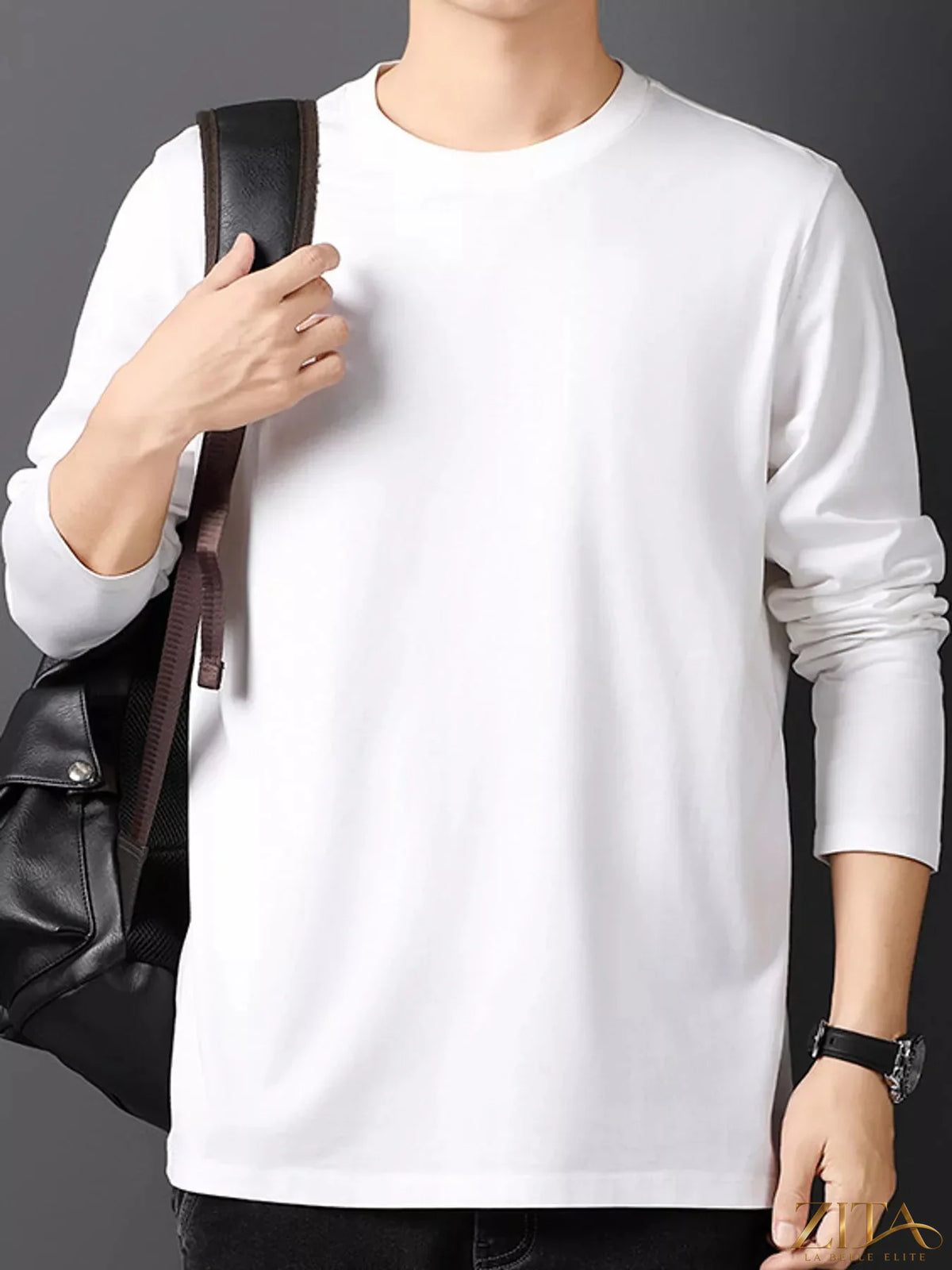 Men's plus size round neck long sleeve T-shirt by Trendsi, showing a comfortable fit in black fabric with subtle stitching details.