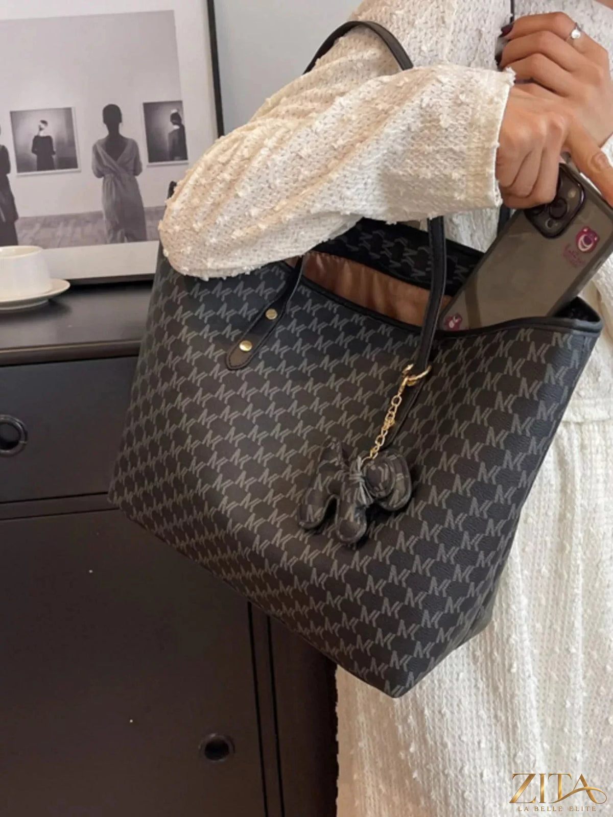 Trendsi PU leather shoulder bag with adjustable strap, sleek design, and spacious interior, perfect for everyday use.