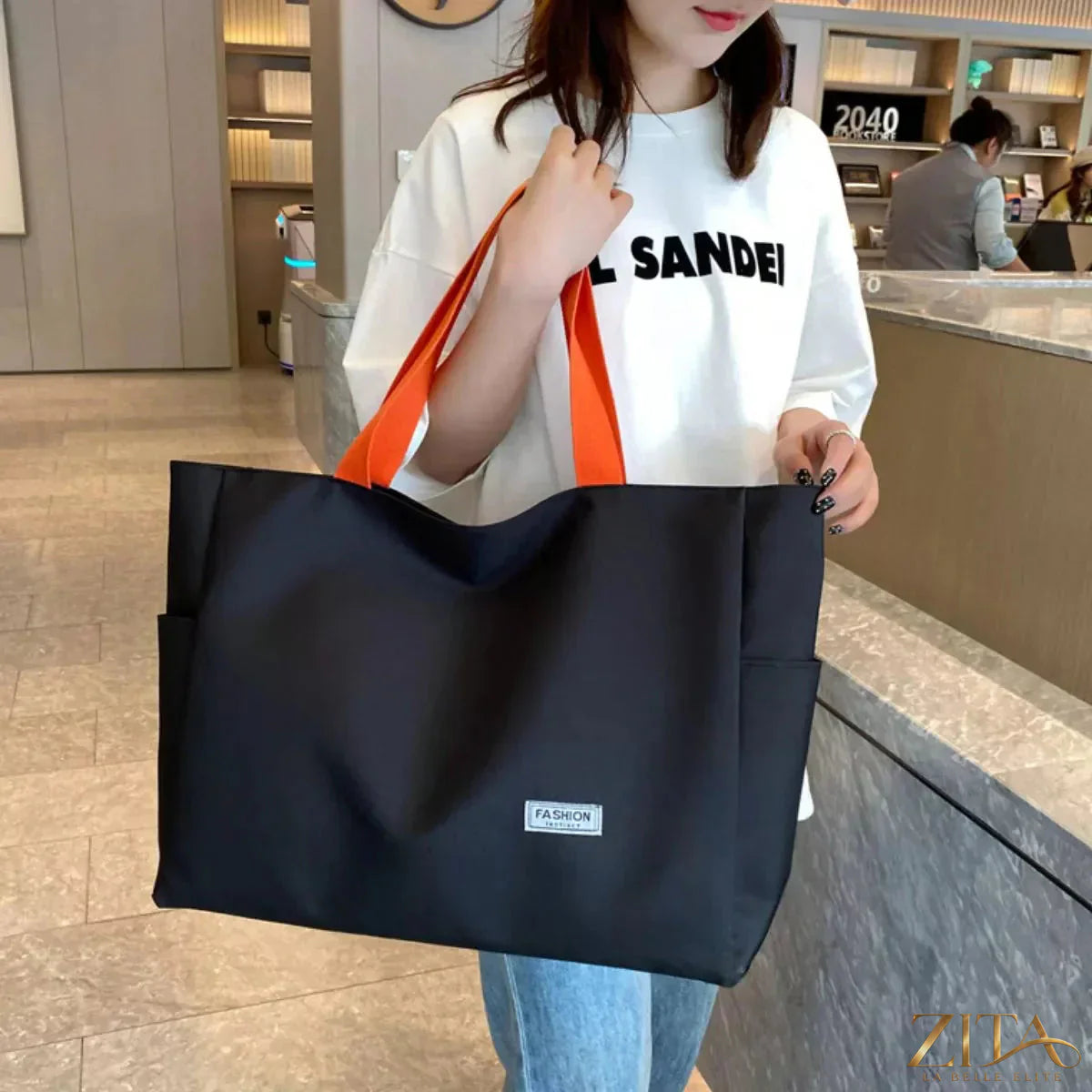 Large capacity canvas shoulder bag by Zita La Belle Elite with adjustable strap and multiple compartments for everyday use.