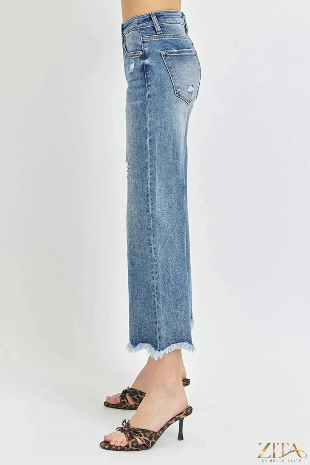 Zita La Belle Elite Risen high rise cropped flare jeans shown on a model, featuring a fitted waist, cropped length, and flared legs.