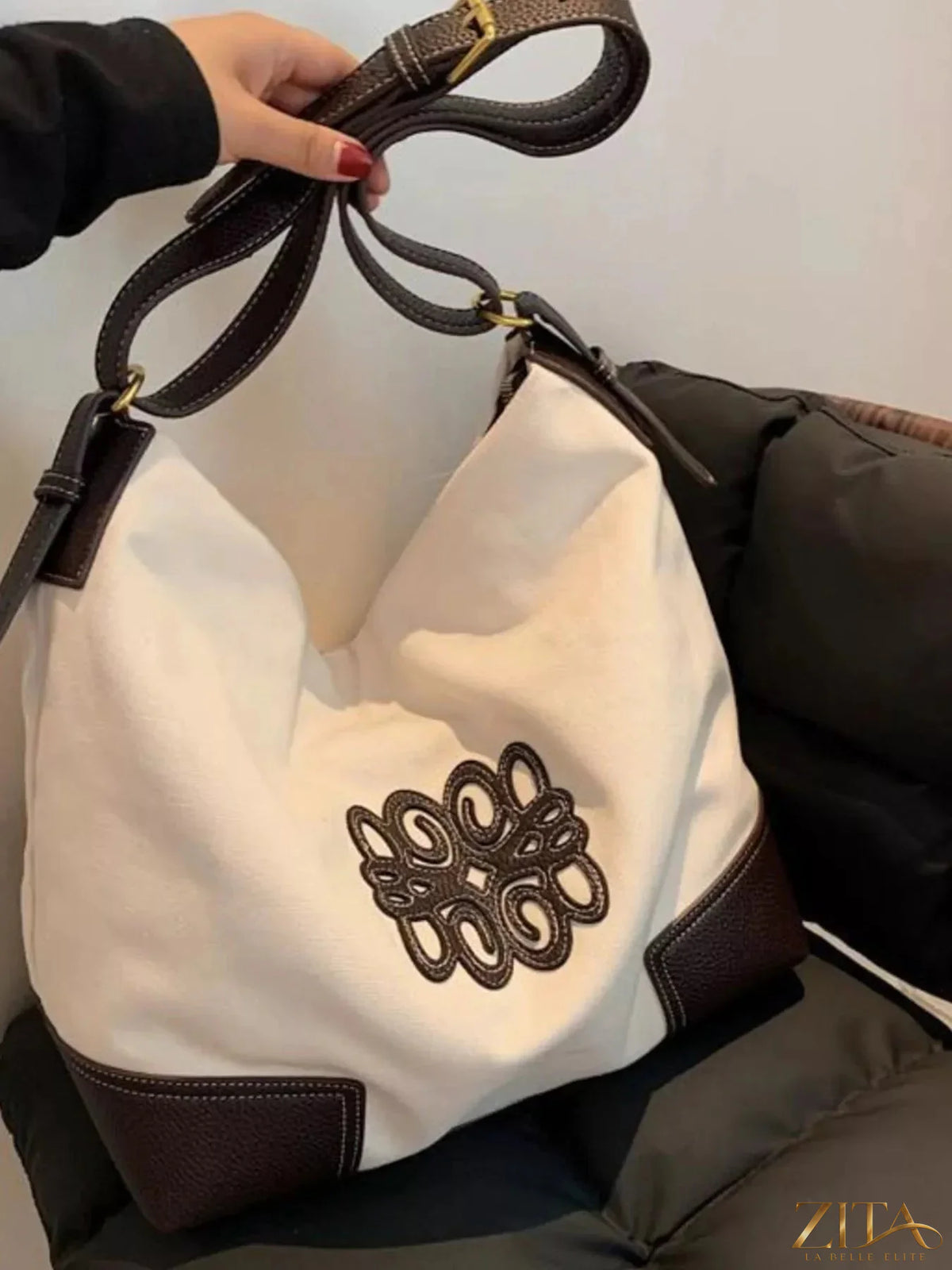 Embroidered canvas tote bag by Zita La Belle Elite featuring colorful floral embroidery and sturdy handles.