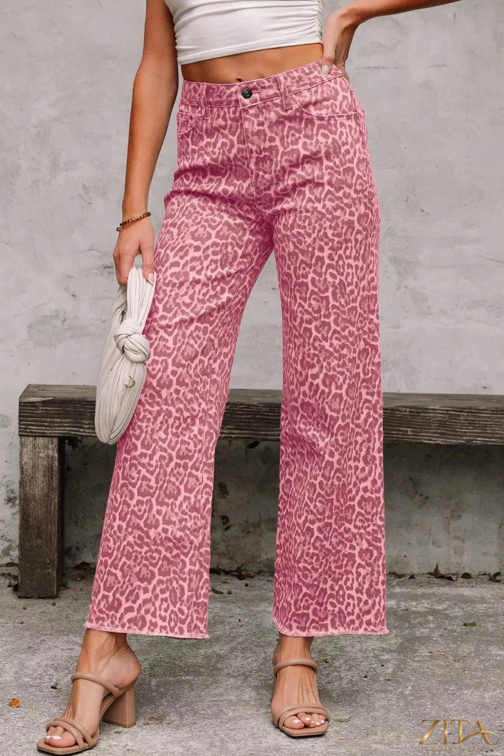 Leopard print frayed edge wide-leg high-waist jeans by Zita La Belle Elite, shown with distressed detailing and relaxed fit.