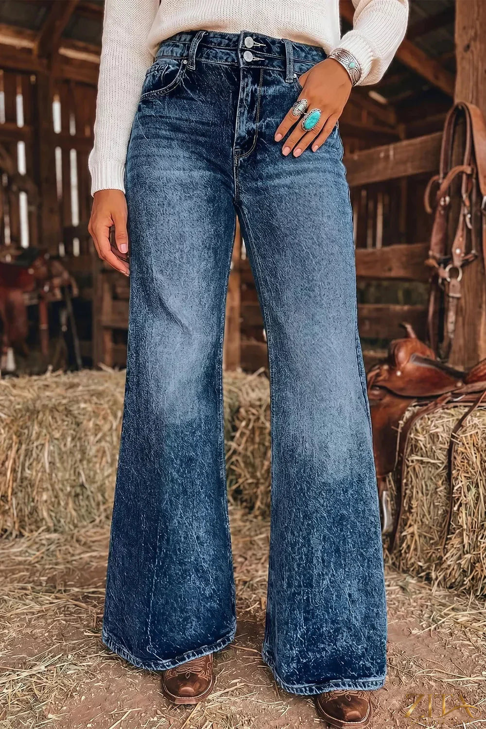Zita La Belle Elite acid wash flare jeans with pocket details and high-rise fit, showcasing distressed denim style.