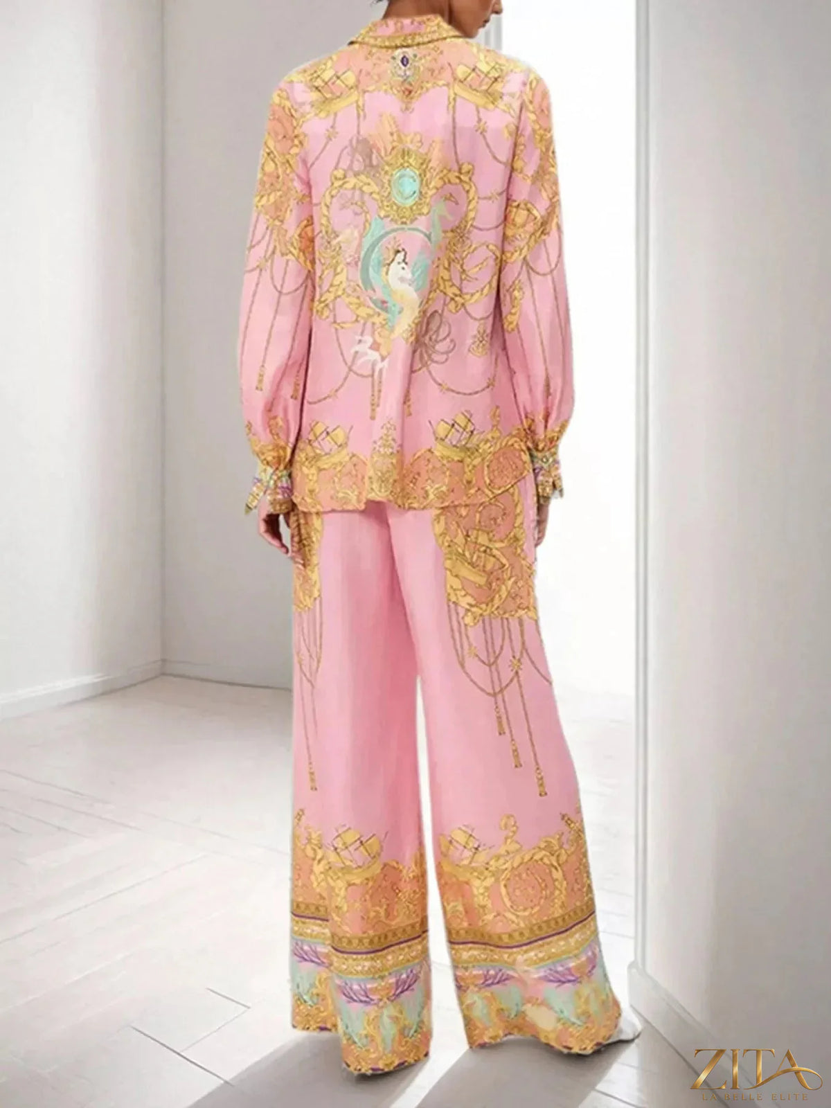 Printed lantern sleeve top and matching pants set by Zita La Belle Elite, featuring a stylish design and comfortable fit.