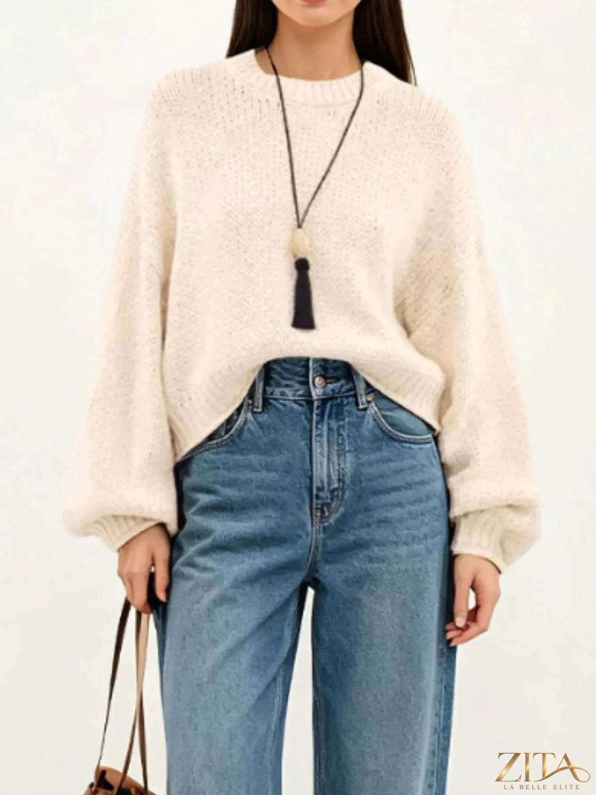 Oversized chunky knit sweater by Trendsi, featuring thick yarn, cozy fit, and stylish loose sleeves in soft neutral tones.