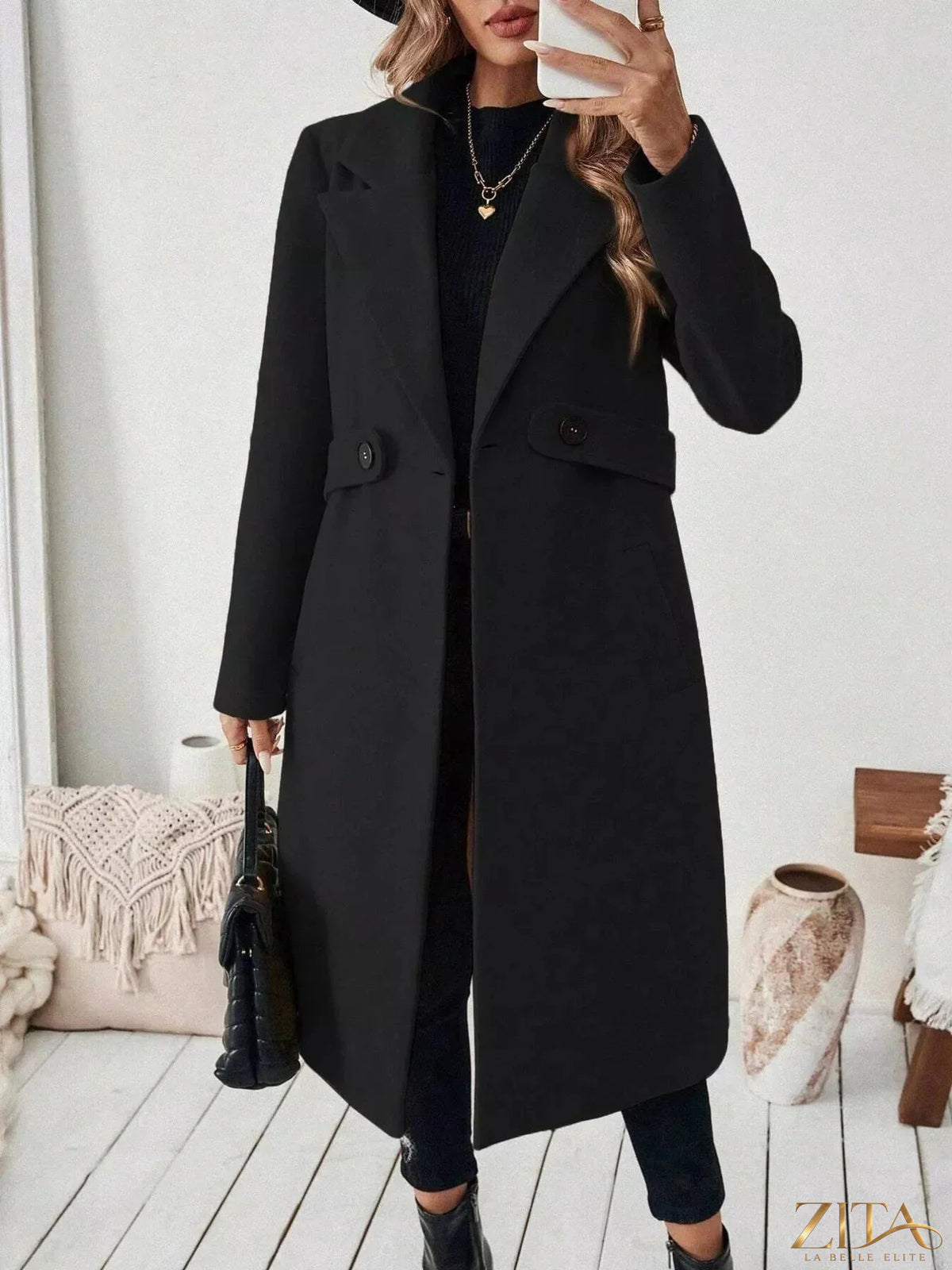 Zita La Belle Elite lapel collar longline coat with tailored fit and button closure, styled with pockets and sleek fabric.