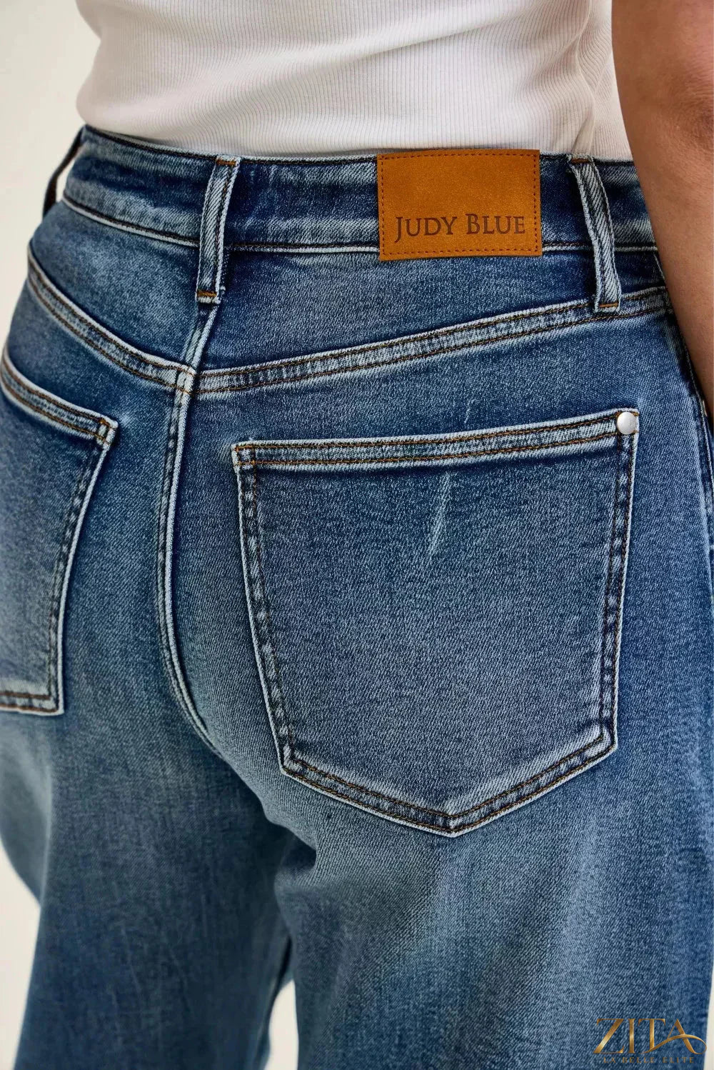 Judy Blue high waist Marlow arc dark weathered indigo jeans with distressed details, styled by Zita La Belle Elite.