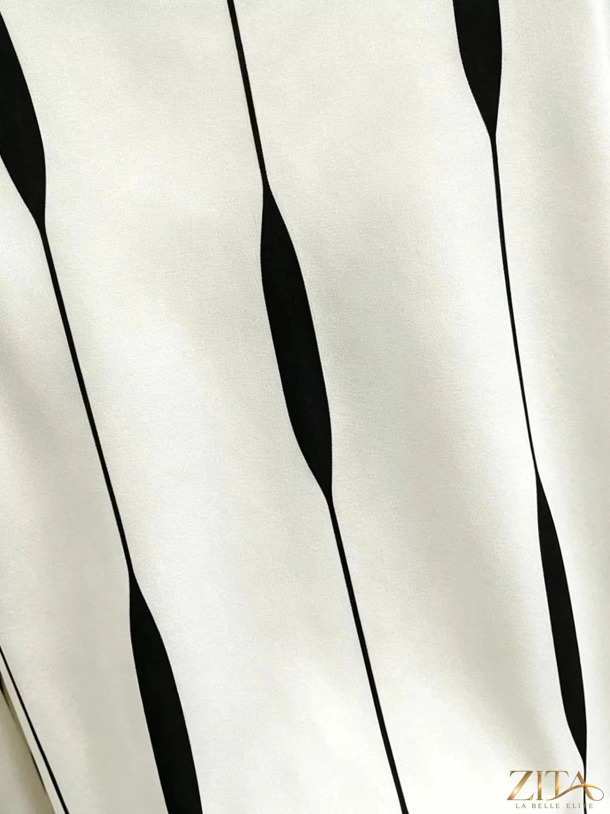 Zita La Belle Elite contrast vertical stripe long sleeve blouse with black and white pattern, stylish and fitted for women.