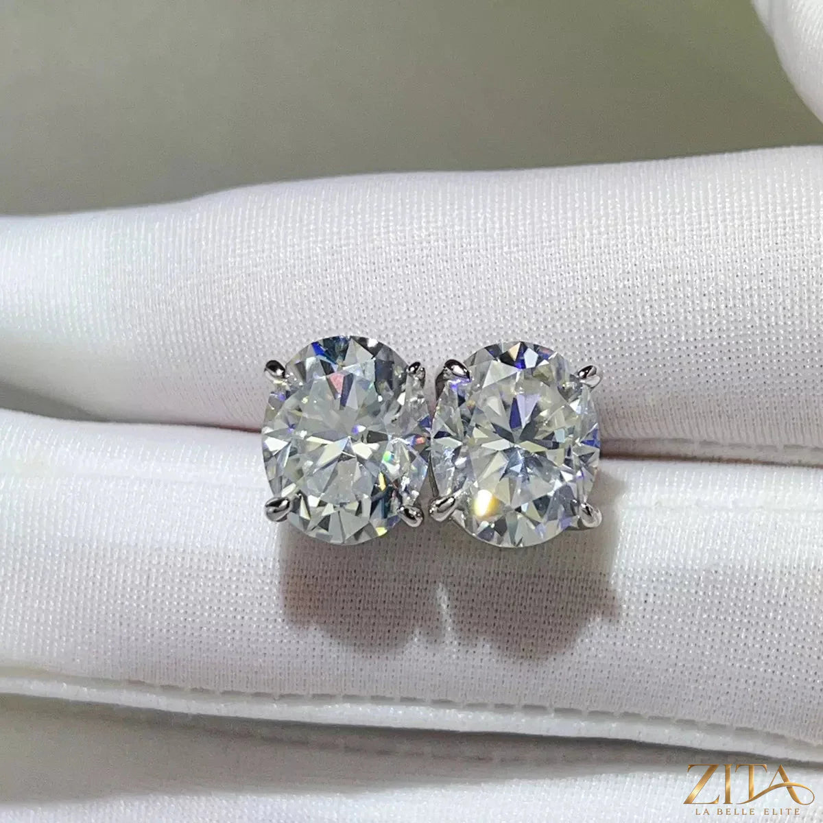 Sterling silver moissanite earrings featuring 10-carat stones, elegant and sparkling jewelry for special occasions.