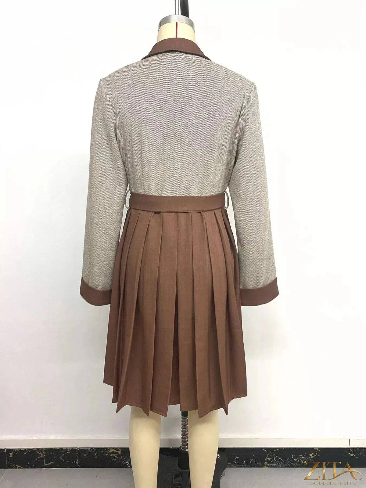 Zita La Belle Elite pleated patchwork blazer belt dress featuring a stylish, fitted design with a mix of fabrics and a waist belt.