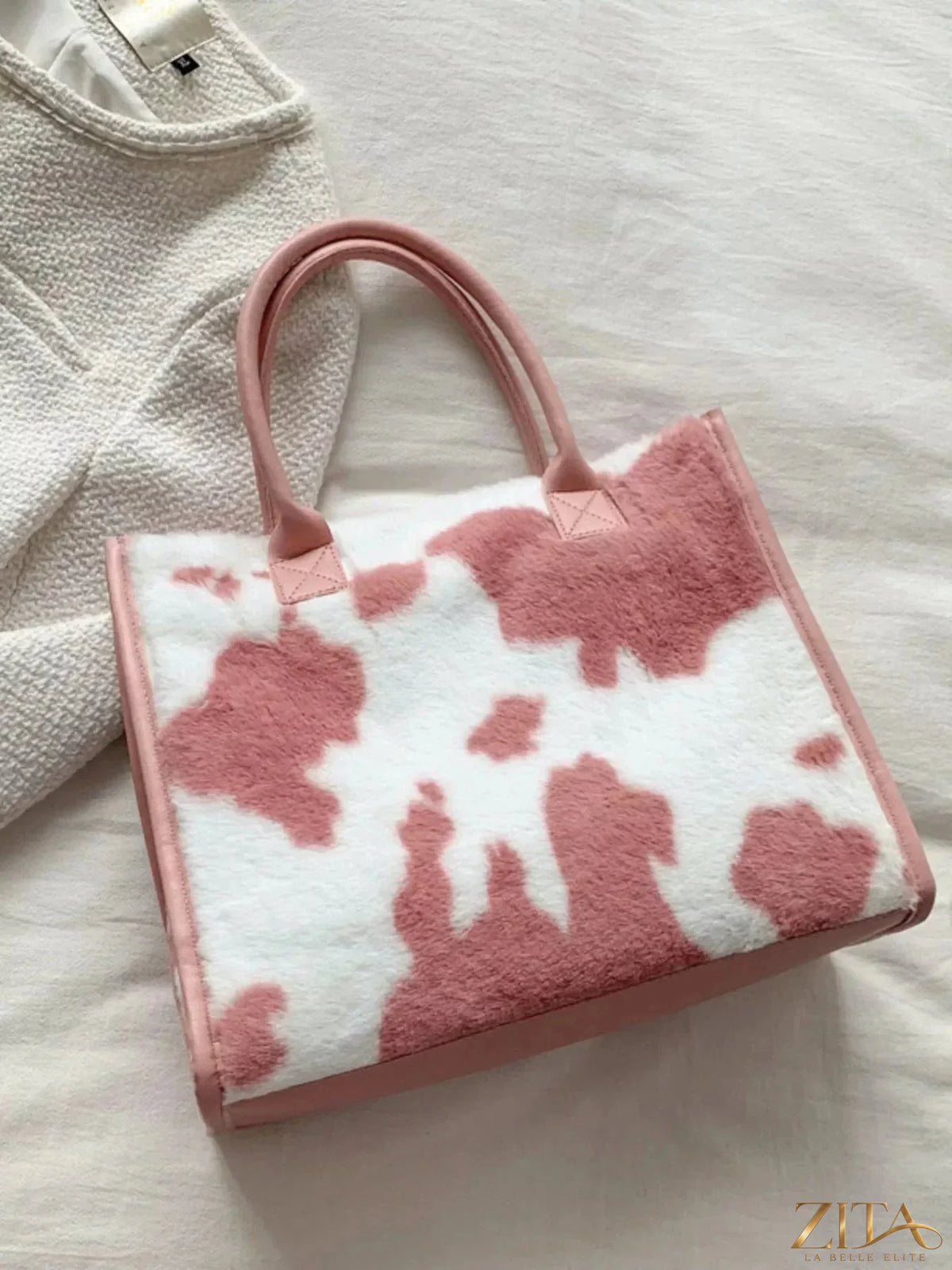 Soft plush tote bag by Zita La Belle Elite with rounded handles and textured surface, perfect for casual or stylish carry.