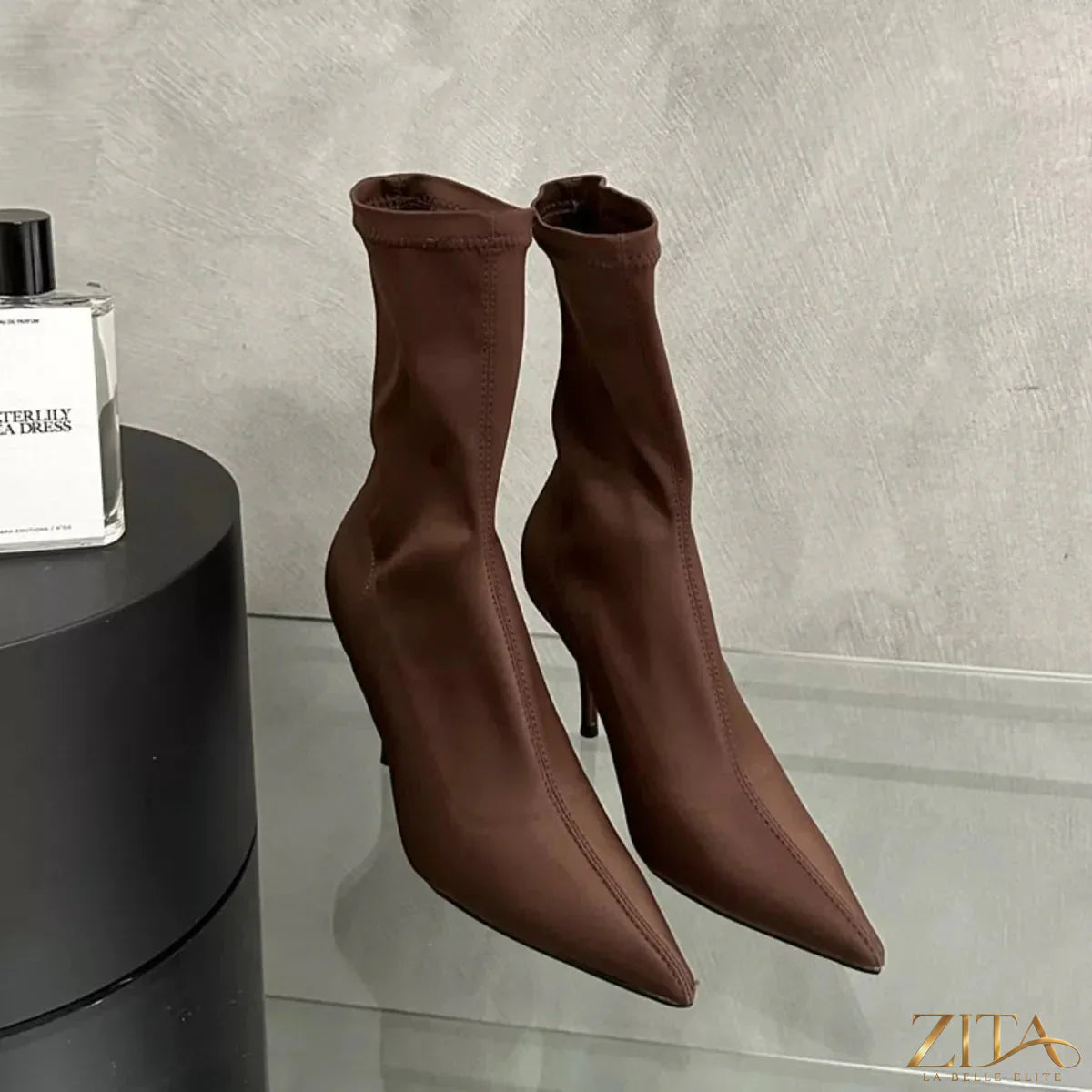 Zita La Belle Elite point toe mid heel boots in black leather, featuring a sleek design and stylish silhouette.