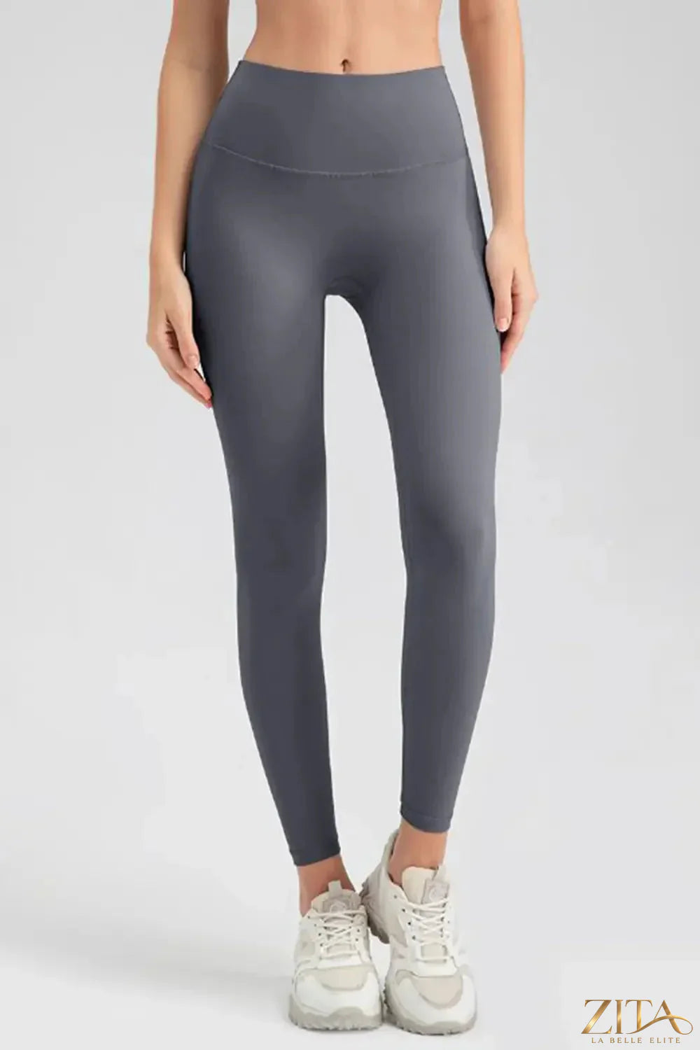 Black wide waistband sport leggings from Trendsi with a high-rise design and stretchy fabric for activewear and workout comfort.