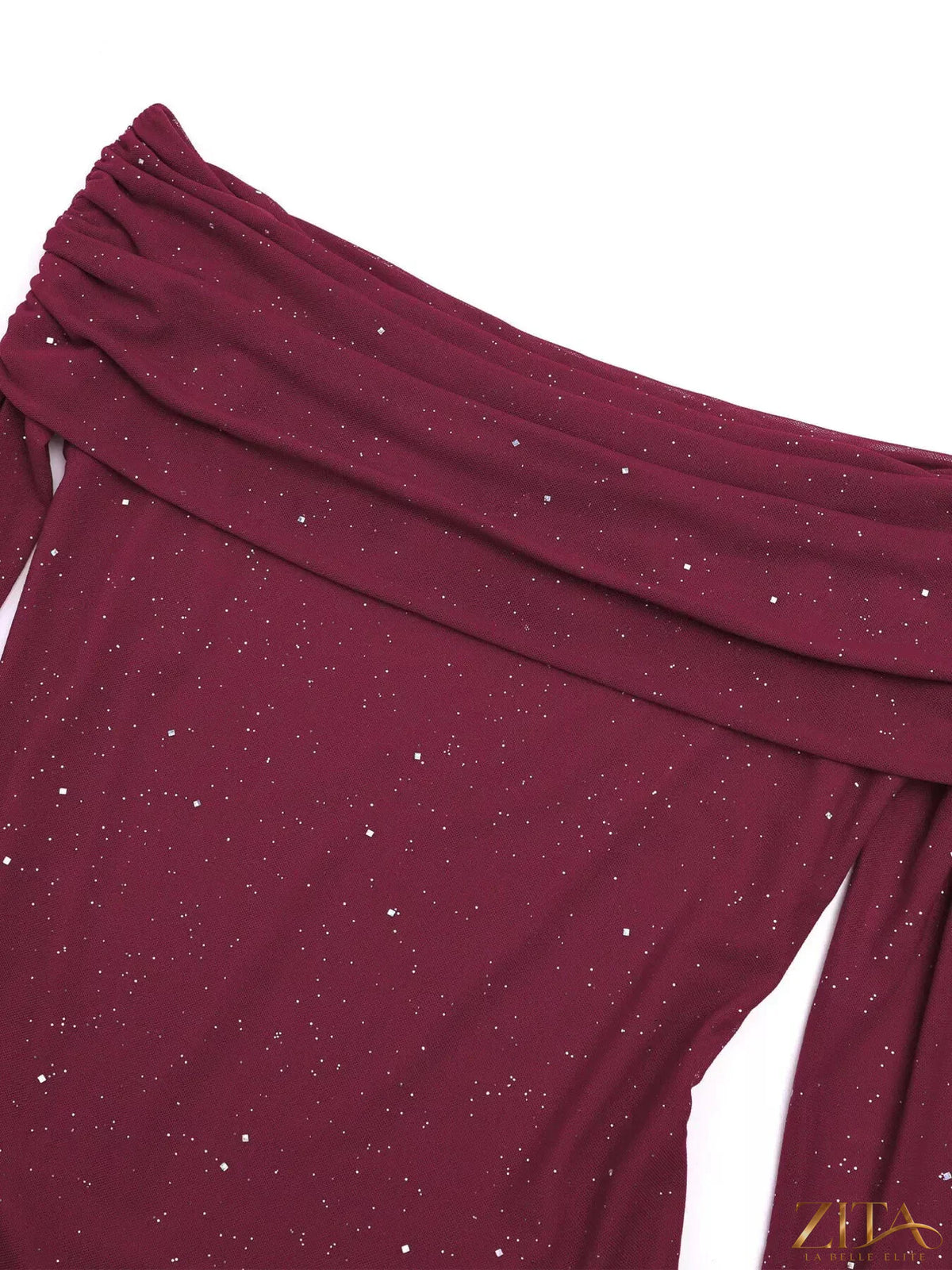 Zita La Belle Elite glitter off-shoulder maxi dress featuring shimmer fabric and flowing silhouette, displayed on a mannequin.