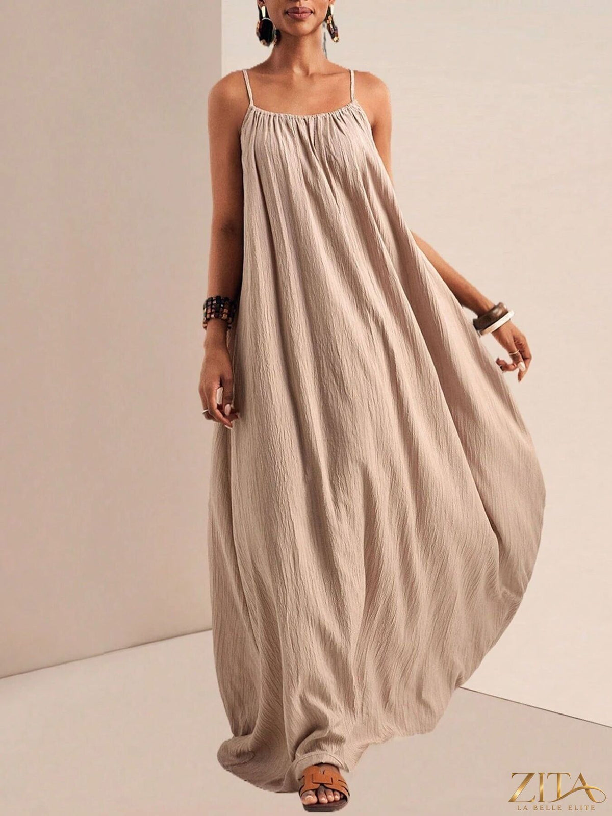 Zita La Belle Elite spaghetti strap flowy maxi dress with a lightweight, elegant design and a fitted bodice, perfect for summer wear.